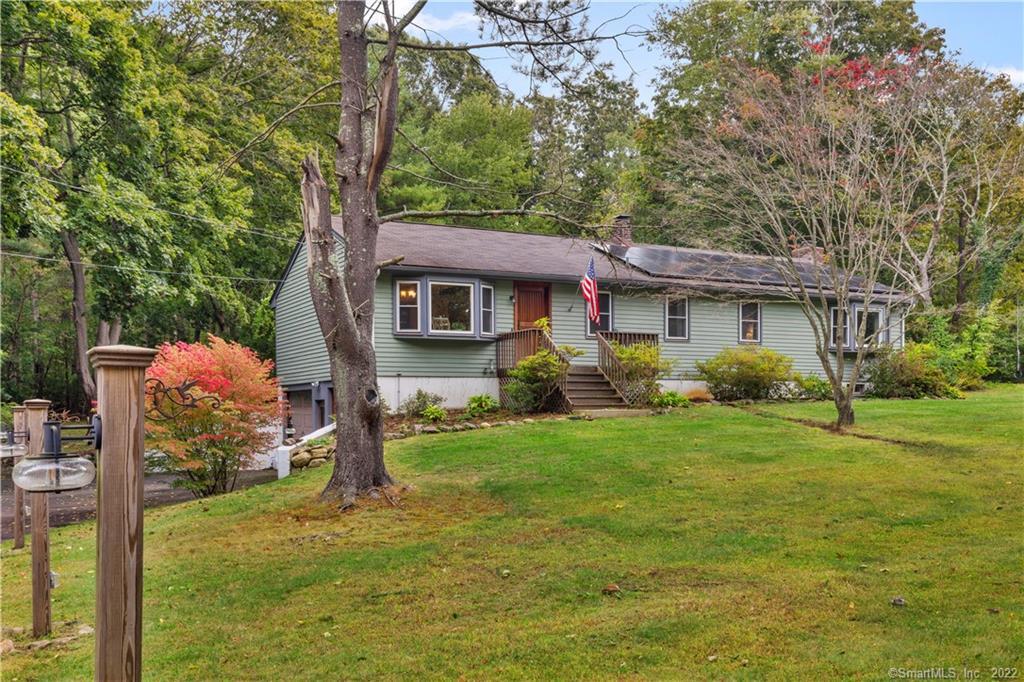 448 Durham Road Madison, CT 06443 - Photo 1 of 1 Front view of the home. Notice the custom lantern fixtures which line the driveway.