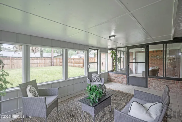a kitchen with sink and cabinets