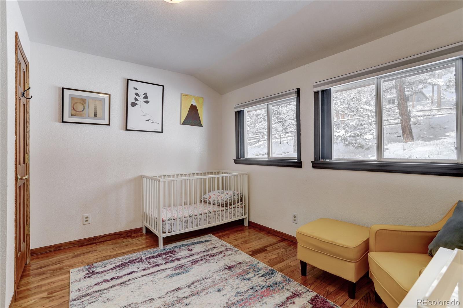 1094 Colorow Road Golden, CO 80401 - Photo 28 of 40 a living room with furniture and a window