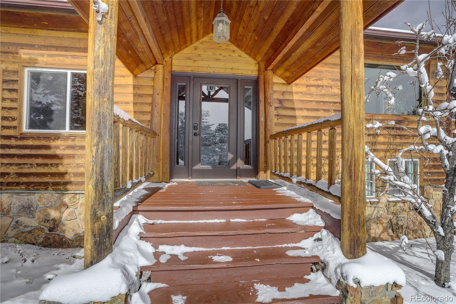1094 Colorow Road Golden, CO 80401 - Photo 3 of 40 a front view of a house with a porch