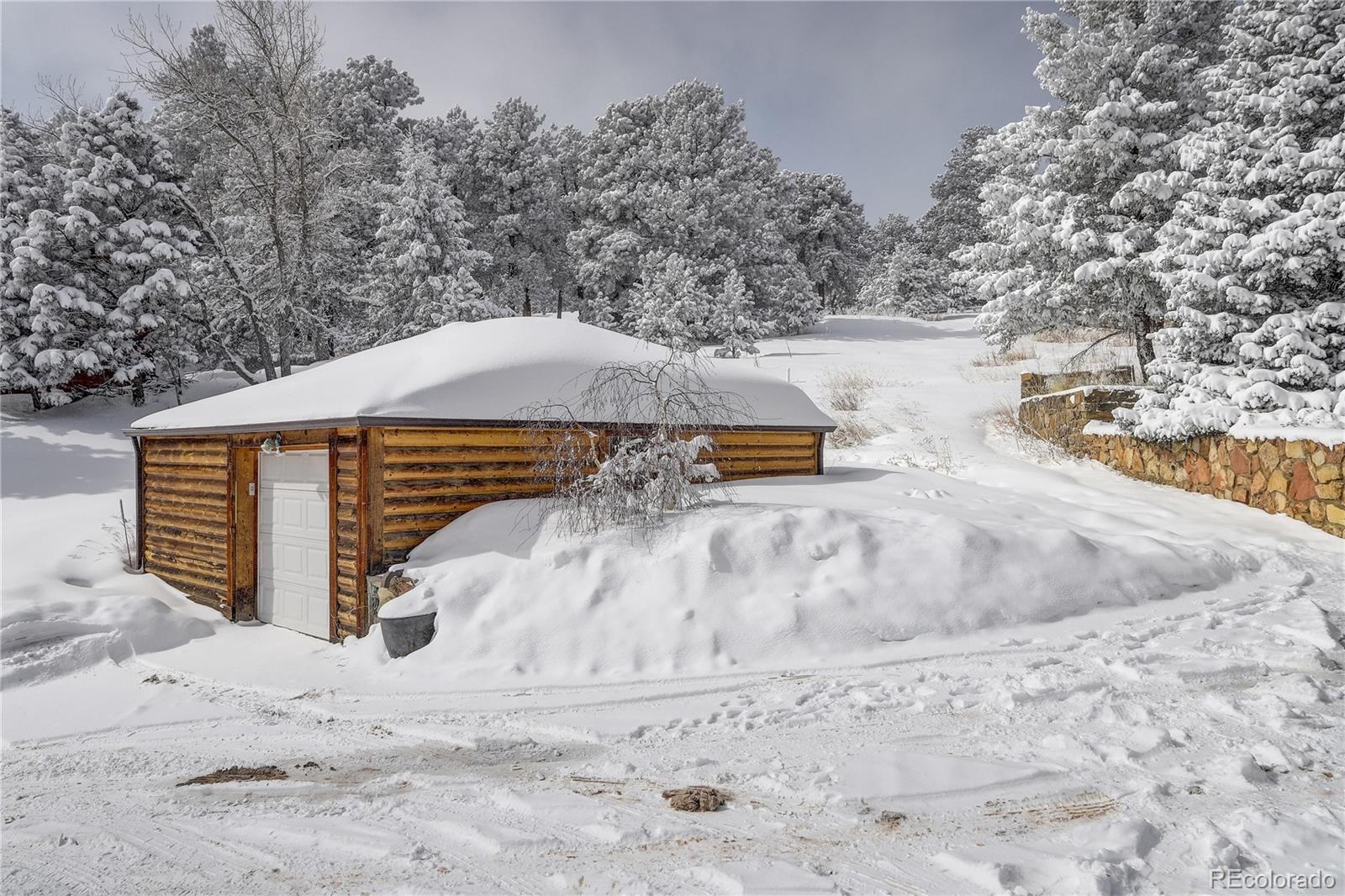 1094 Colorow Road Golden, CO 80401 - Photo 37 of 40 a view of a backyard of snow