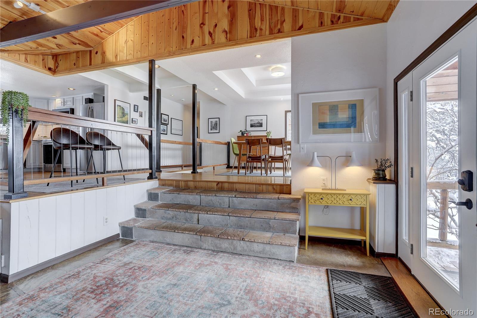 1094 Colorow Road Golden, CO 80401 - Photo 8 of 40 a living room with furniture and a fireplace