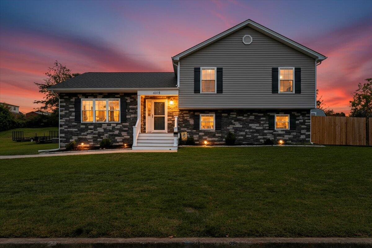 4018 Hazelridge Road Northwest Roanoke, VA 24012 - Photo 1 of 59 a front view of a house with a yard