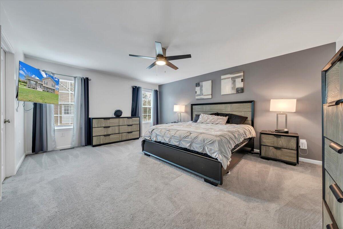 4018 Hazelridge Road Northwest Roanoke, VA 24012 - Photo 18 of 59 a bedroom with bed and window