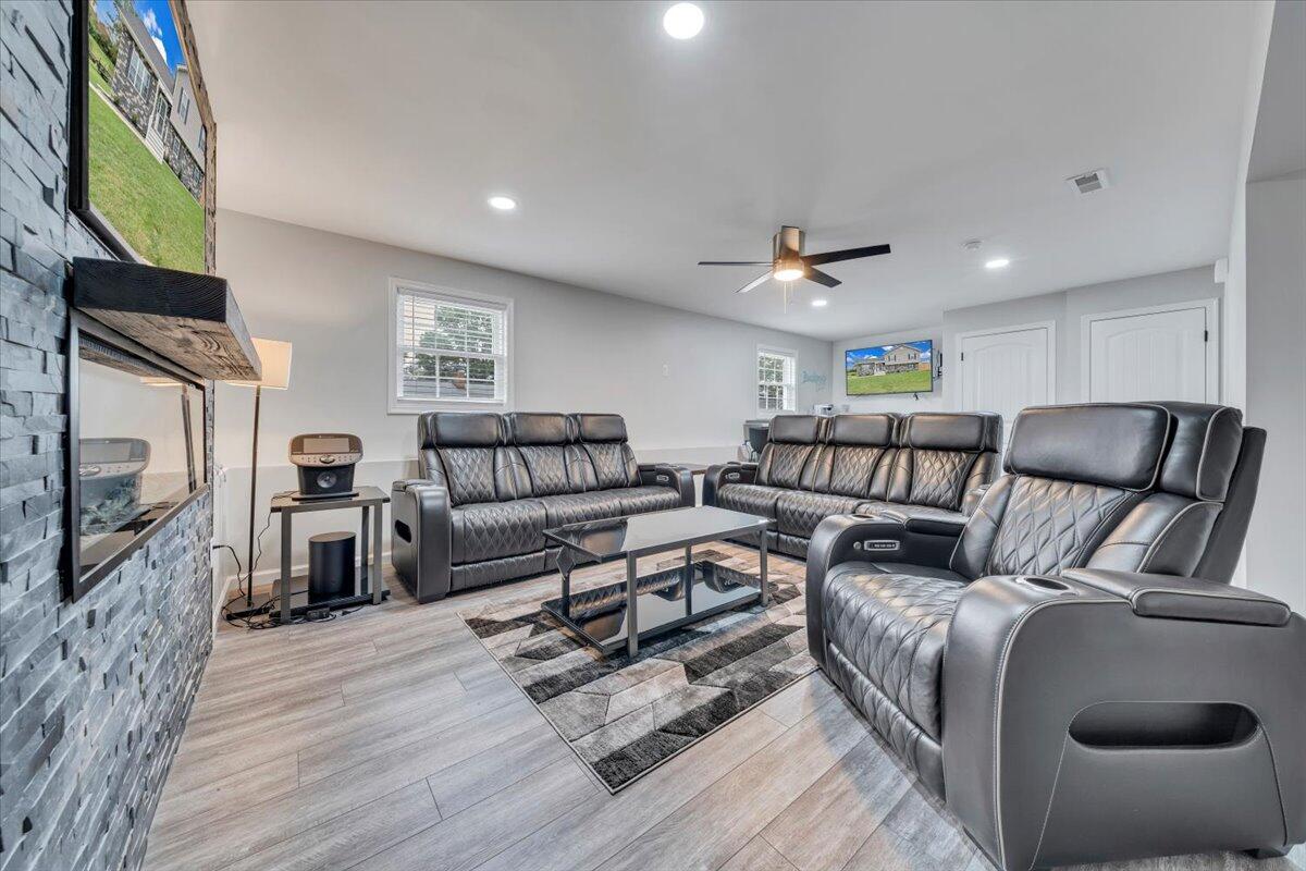 4018 Hazelridge Road Northwest Roanoke, VA 24012 - Photo 26 of 59 a living room with furniture and a fireplace
