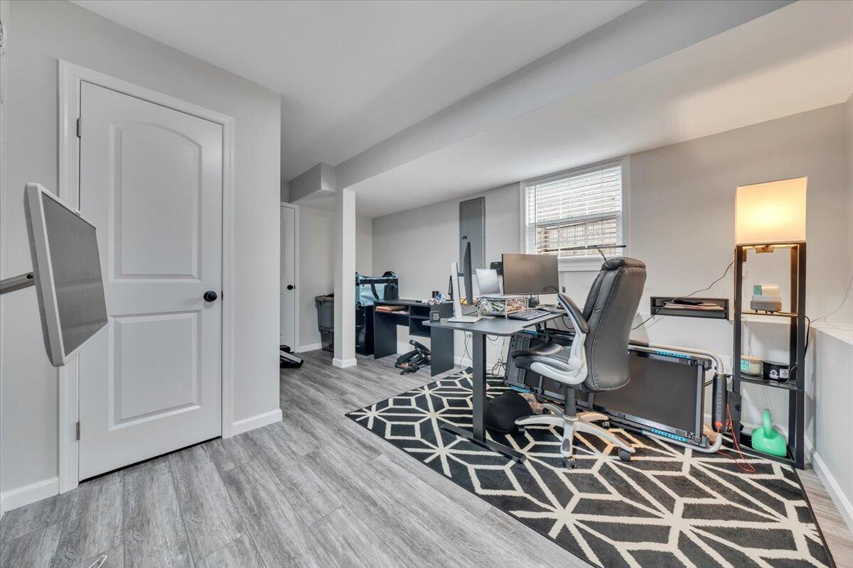 4018 Hazelridge Road Northwest Roanoke, VA 24012 - Photo 29 of 59 a view of a dining room with furniture window and wooden floor