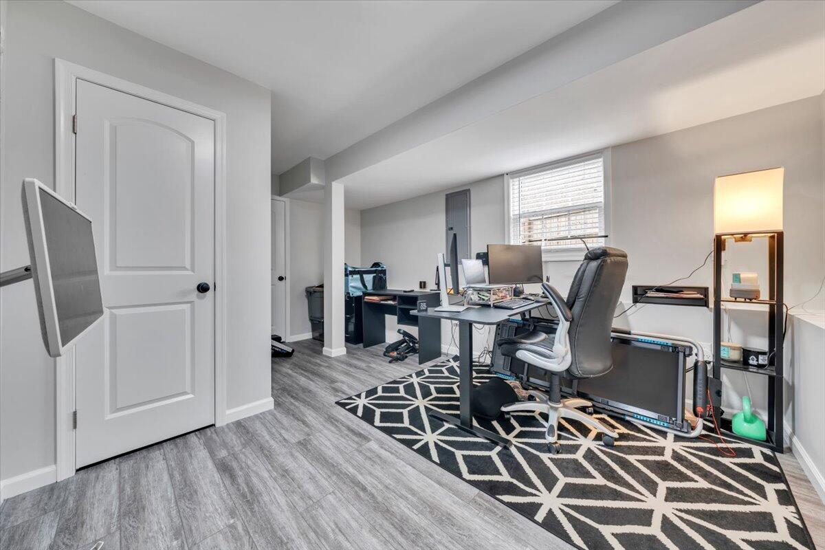 4018 Hazelridge Road Northwest Roanoke, VA 24012 - Photo 30 of 59 a view of a dining room with furniture window and wooden floor