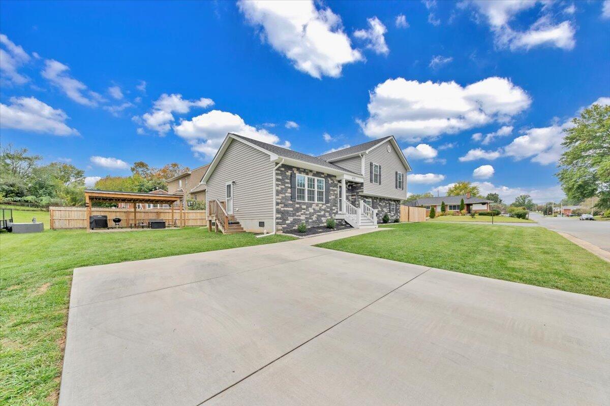 4018 Hazelridge Road Northwest Roanoke, VA 24012 - Photo 43 of 59 a view of a house with a yard