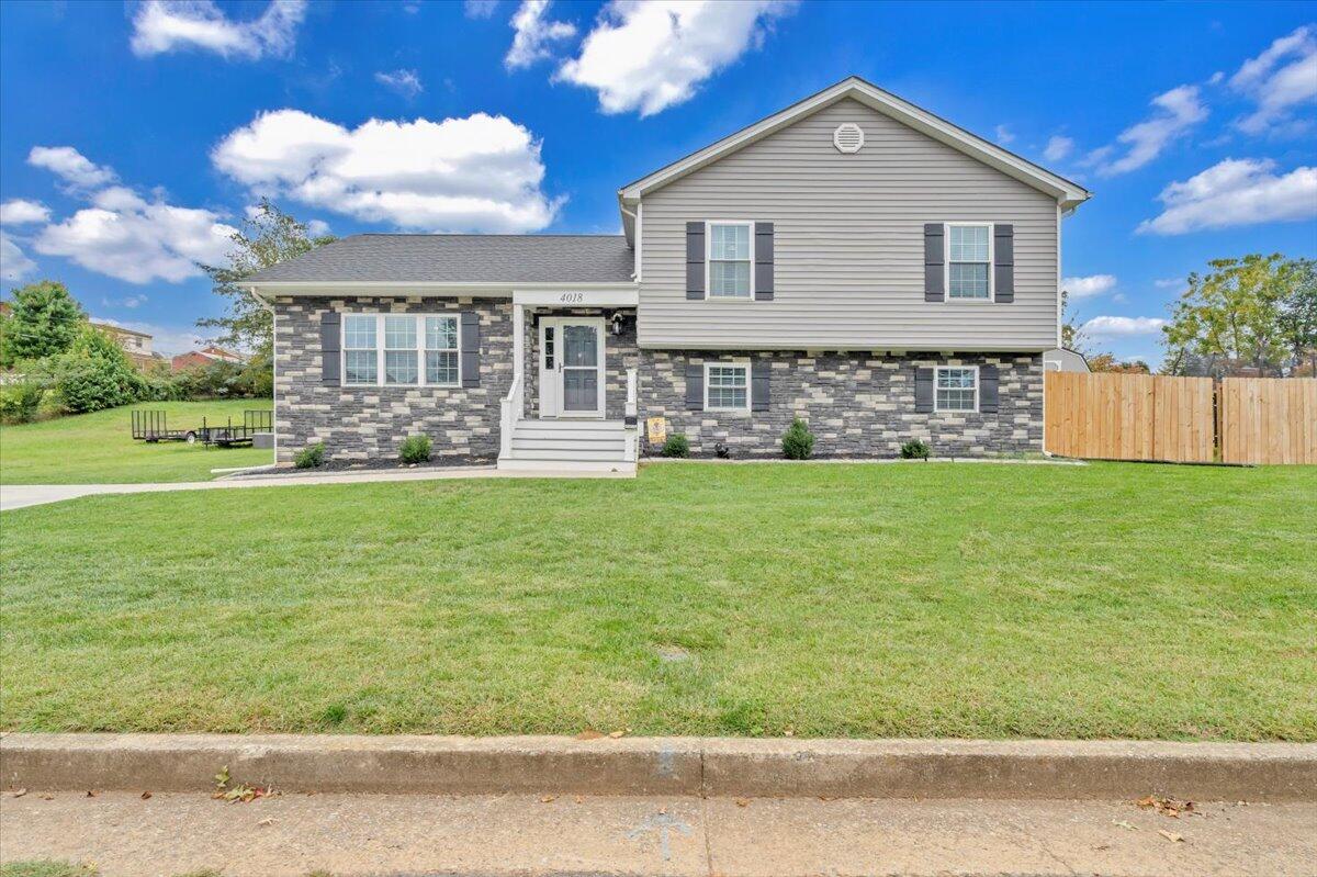 4018 Hazelridge Road Northwest Roanoke, VA 24012 - Photo 46 of 59 a front view of house with yard patio and green space