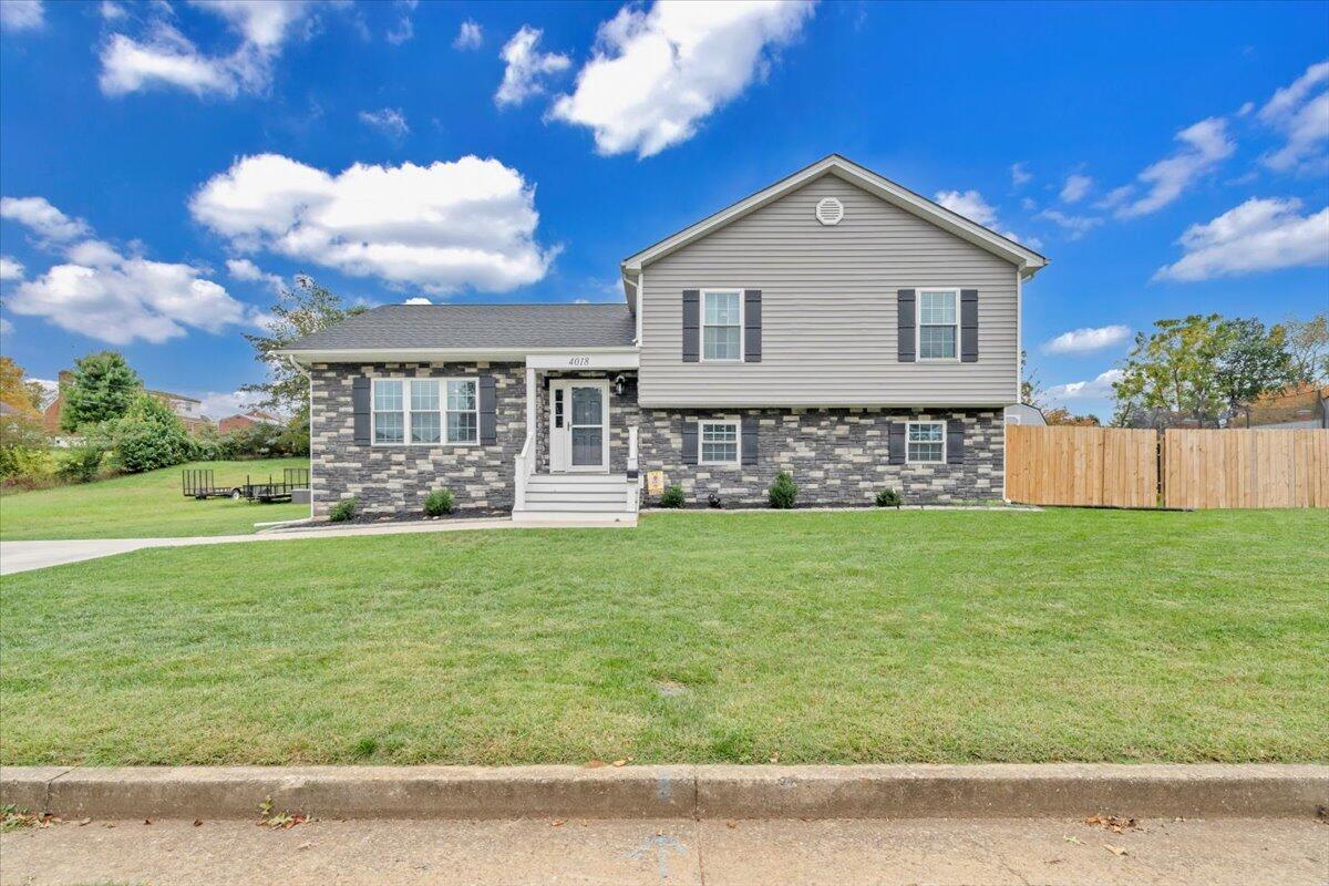 4018 Hazelridge Road Northwest Roanoke, VA 24012 - Photo 48 of 59 a front view of a house with garden