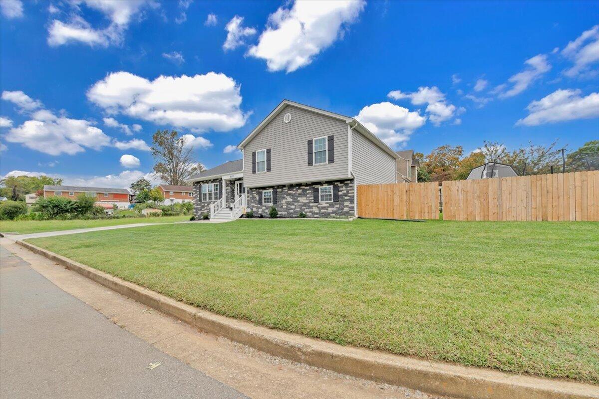 4018 Hazelridge Road Northwest Roanoke, VA 24012 - Photo 52 of 59 a view of a house with a yard