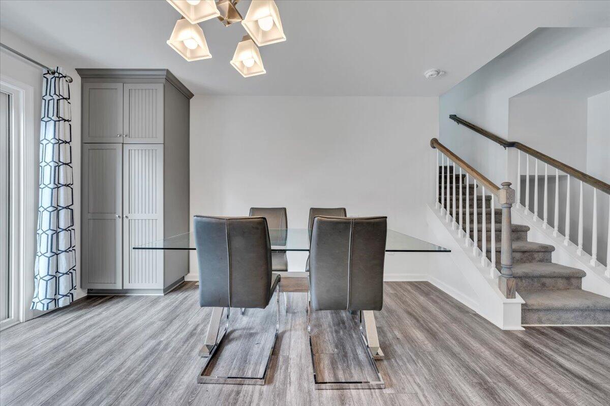 4018 Hazelridge Road Northwest Roanoke, VA 24012 - Photo 10 of 59 a view of a dining room with wooden floor windows and entryway