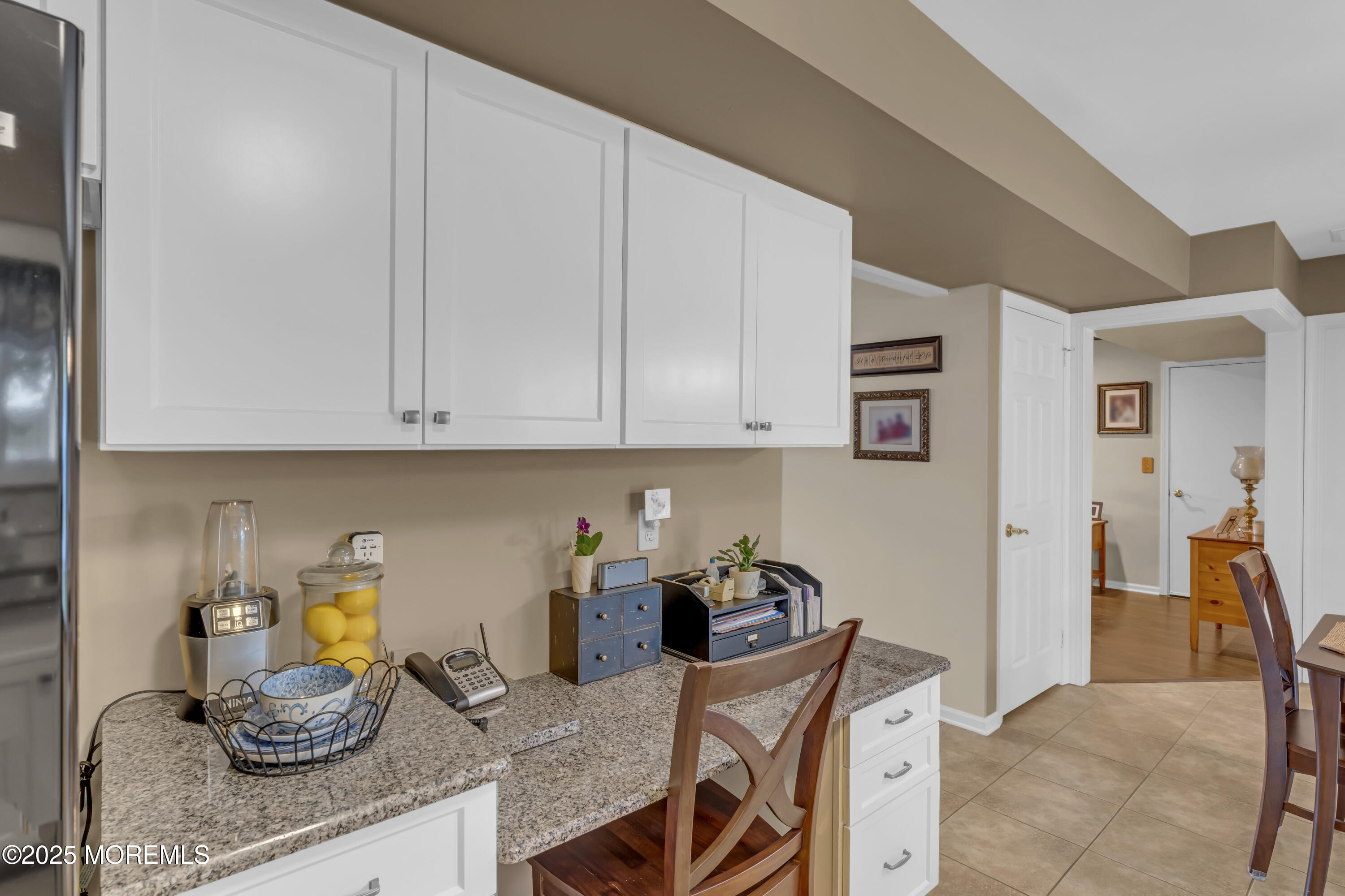 32 Kiwi Loop Howell, NJ 07731 - Photo 13 of 42 a kitchen with a sink and cabinets