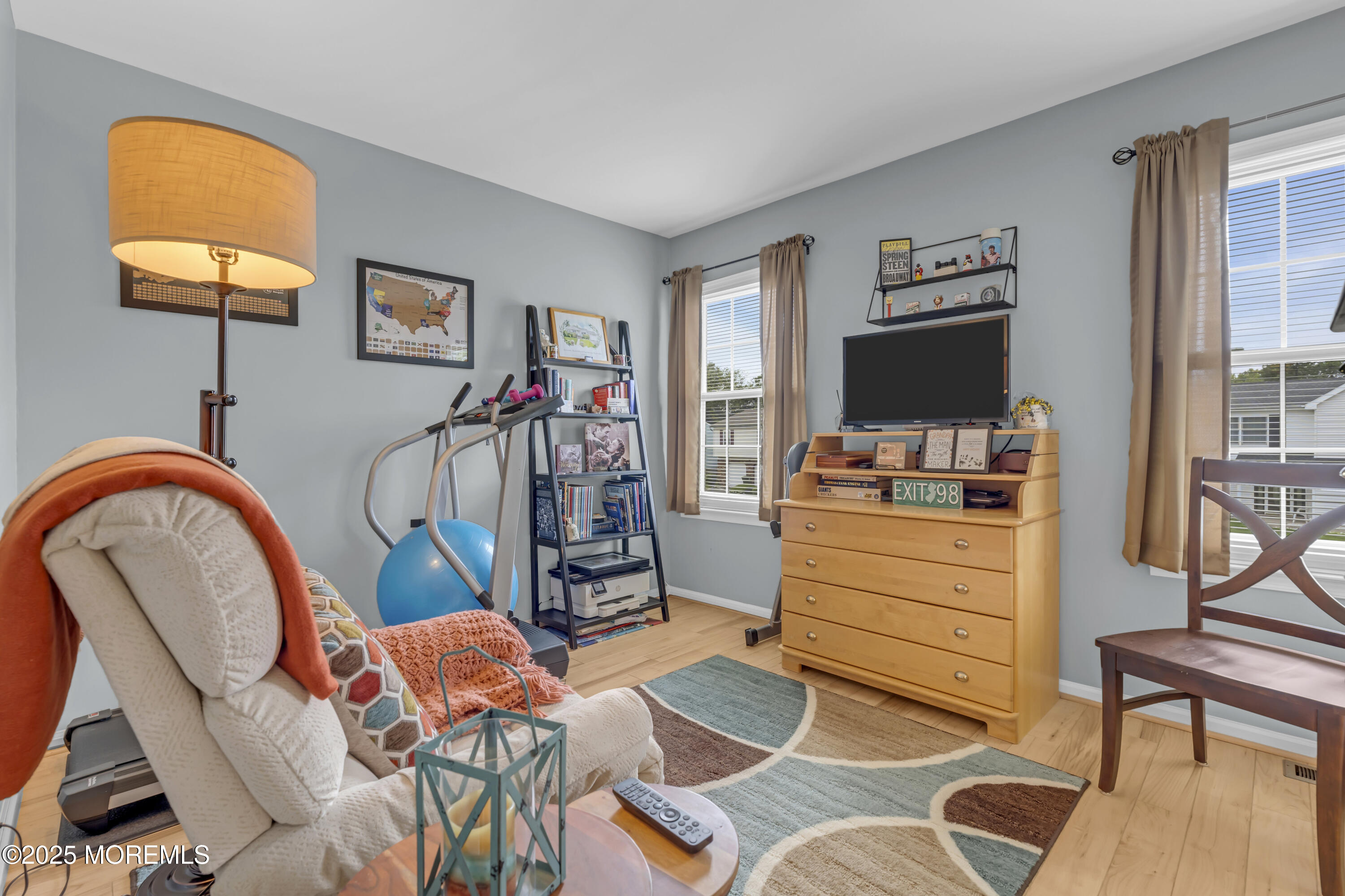 32 Kiwi Loop Howell, NJ 07731 - Photo 19 of 42 a bedroom with a bed and a flat screen tv