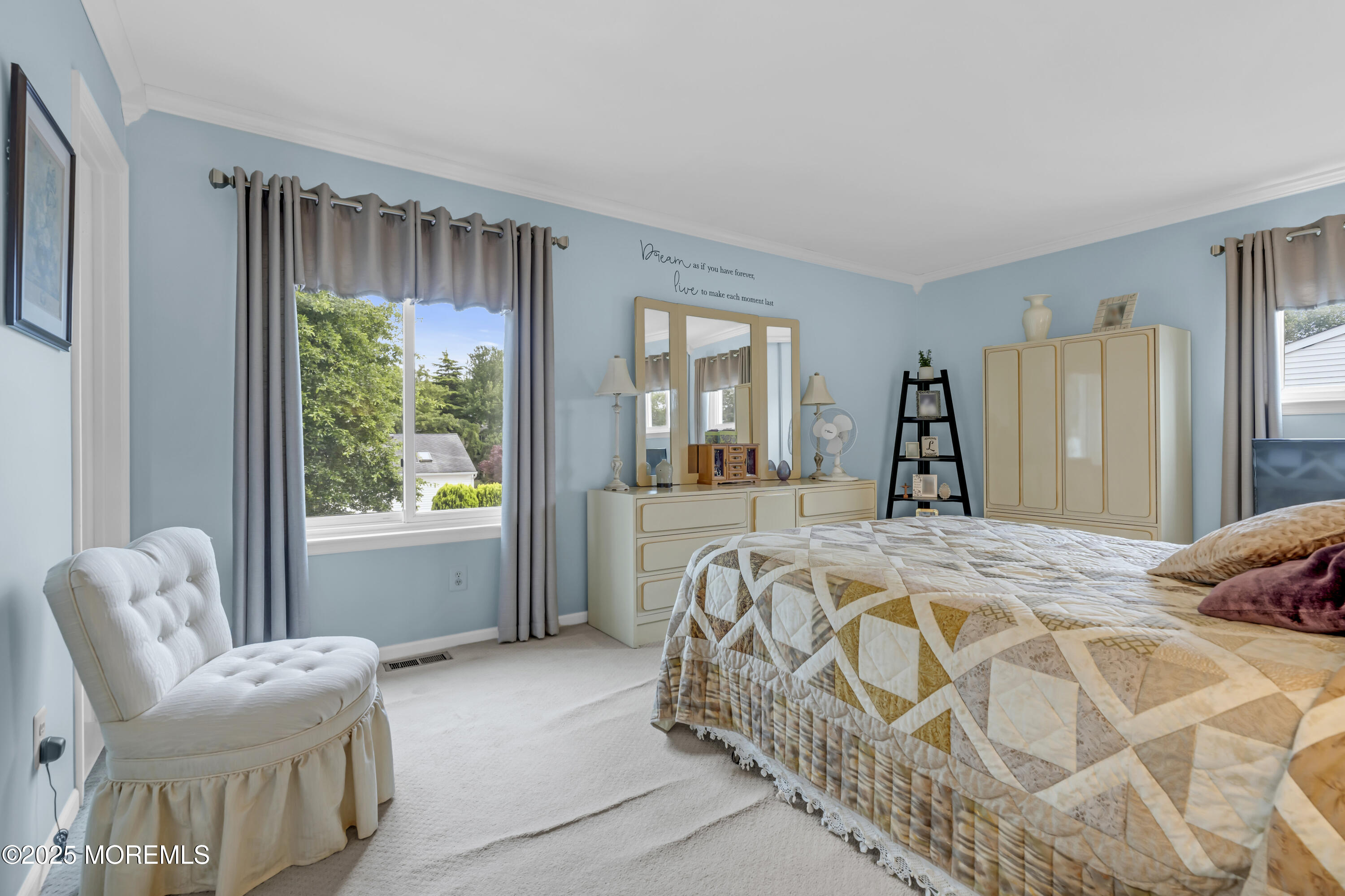 32 Kiwi Loop Howell, NJ 07731 - Photo 22 of 42 a bed sitting in a spacious bedroom next to a window