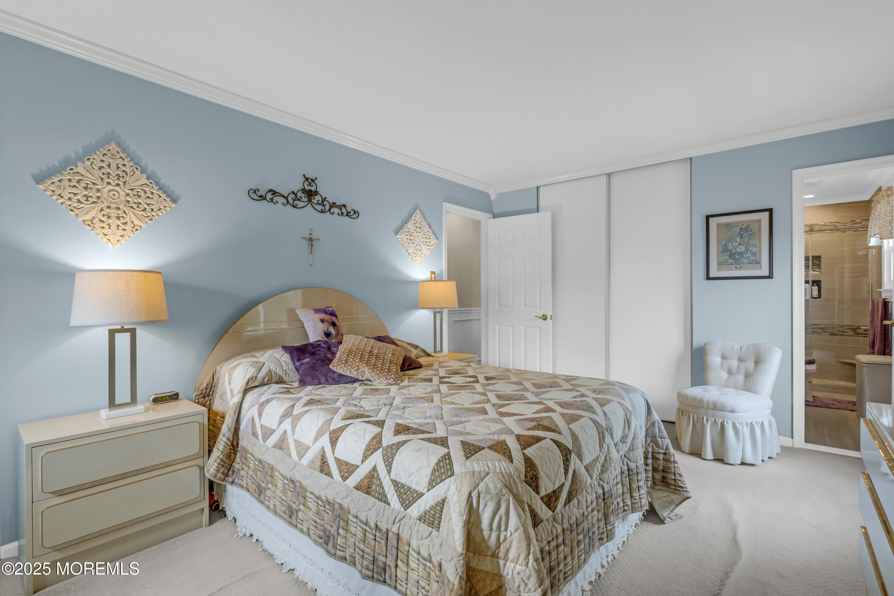 32 Kiwi Loop Howell, NJ 07731 - Photo 25 of 42 a bedroom with a bed and a lamp