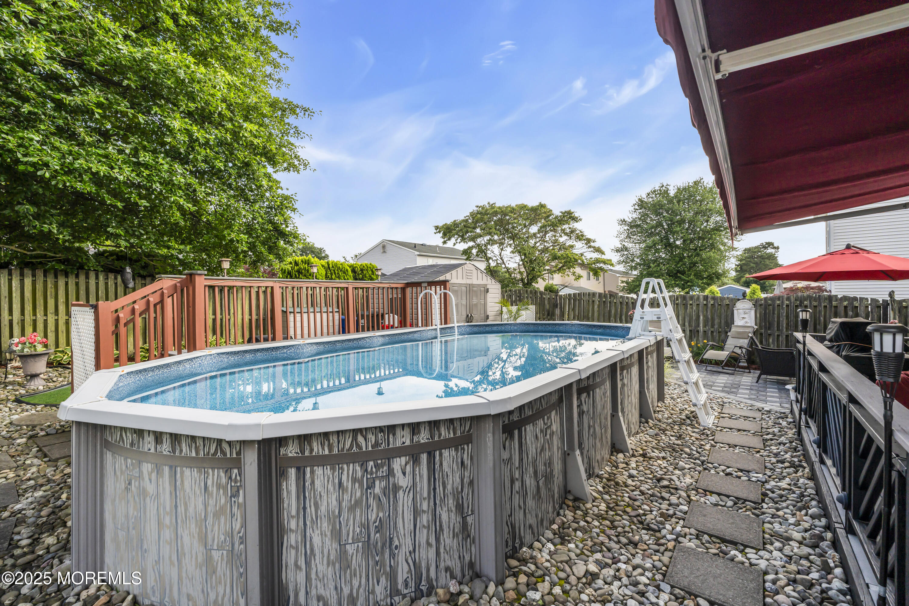 32 Kiwi Loop Howell, NJ 07731 - Photo 40 of 42 a view of a balcony with outdoor seating