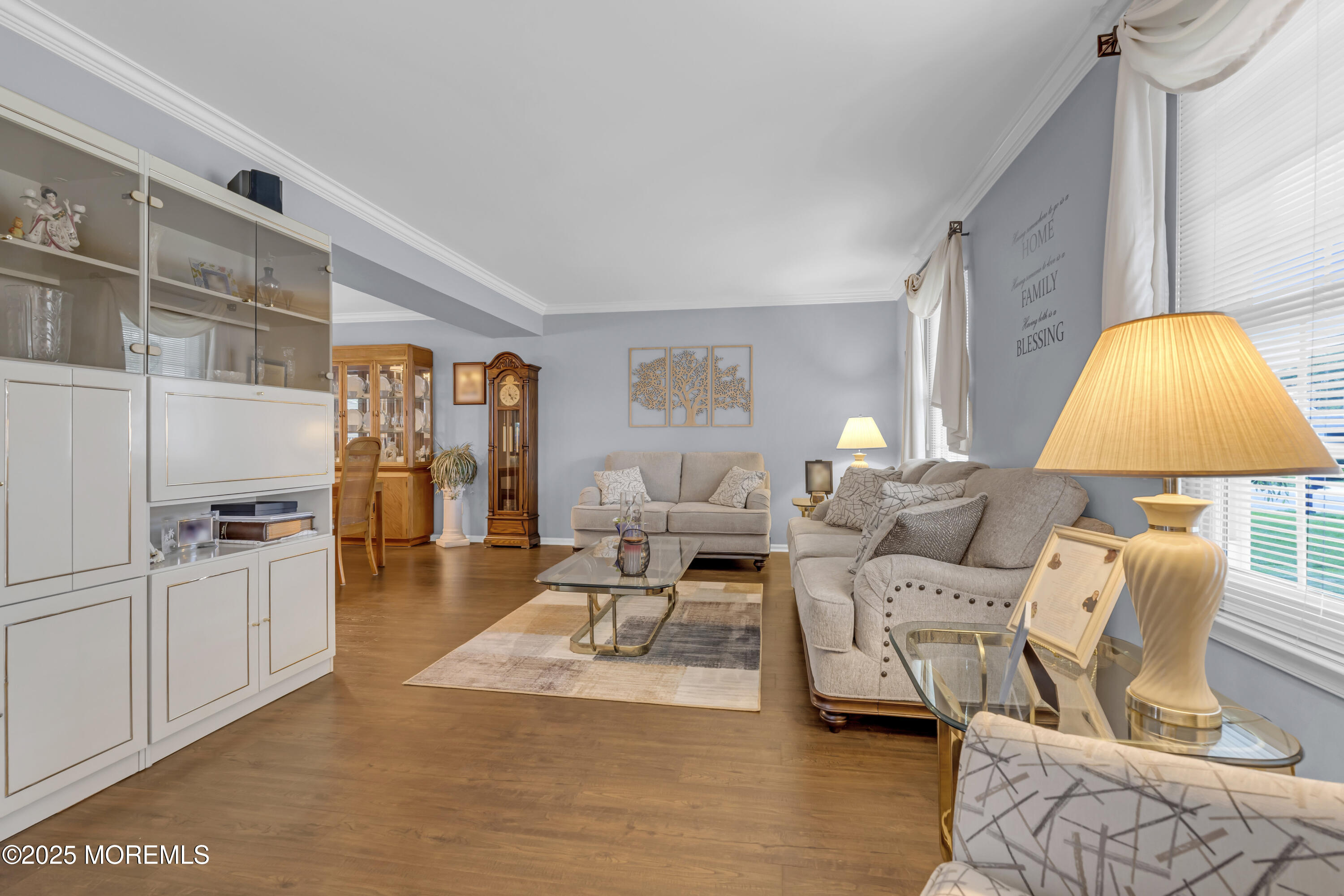 32 Kiwi Loop Howell, NJ 07731 - Photo 5 of 42 a living room with furniture and a flat screen tv