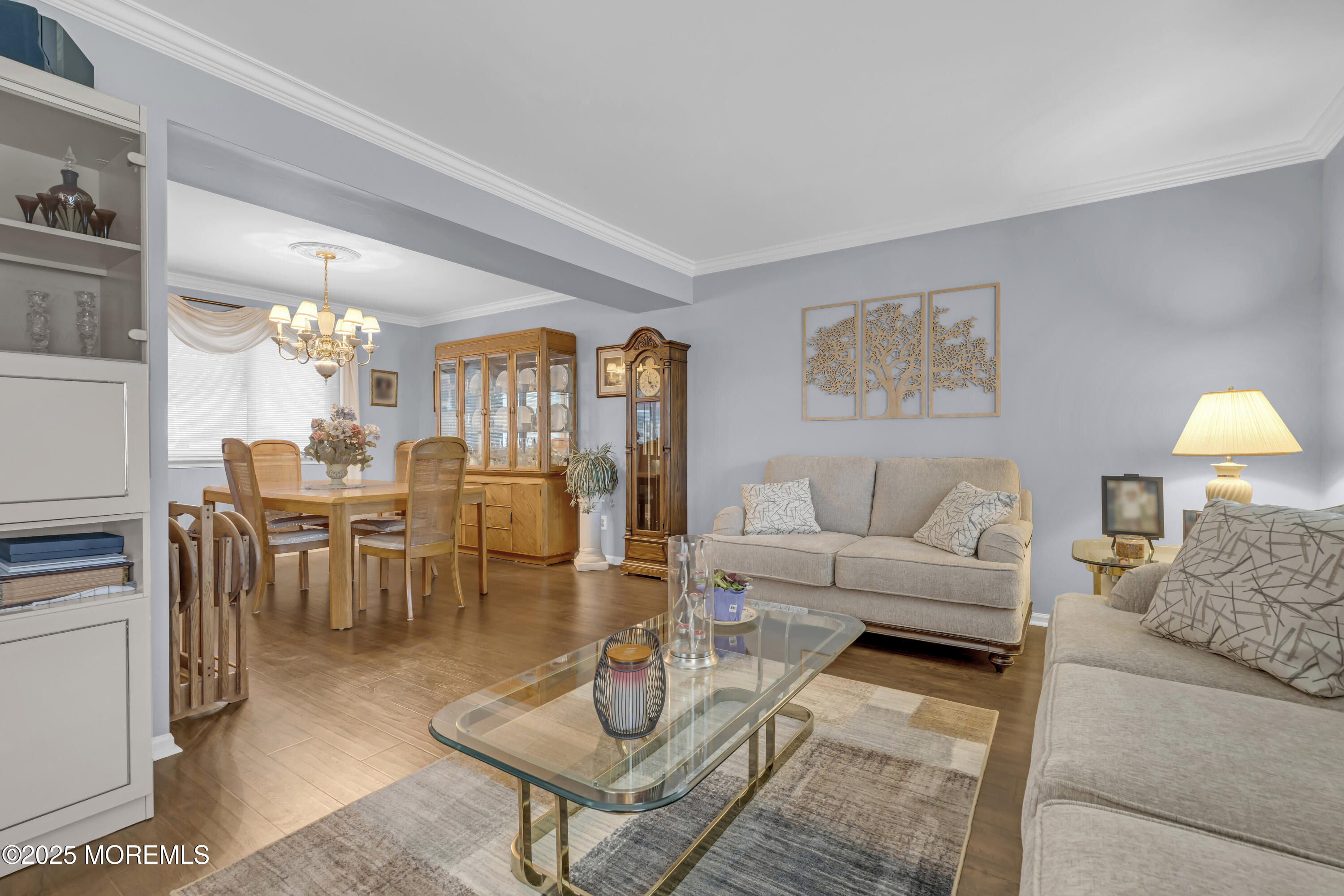 32 Kiwi Loop Howell, NJ 07731 - Photo 6 of 42 a living room with lots of furniture and view of kitchen