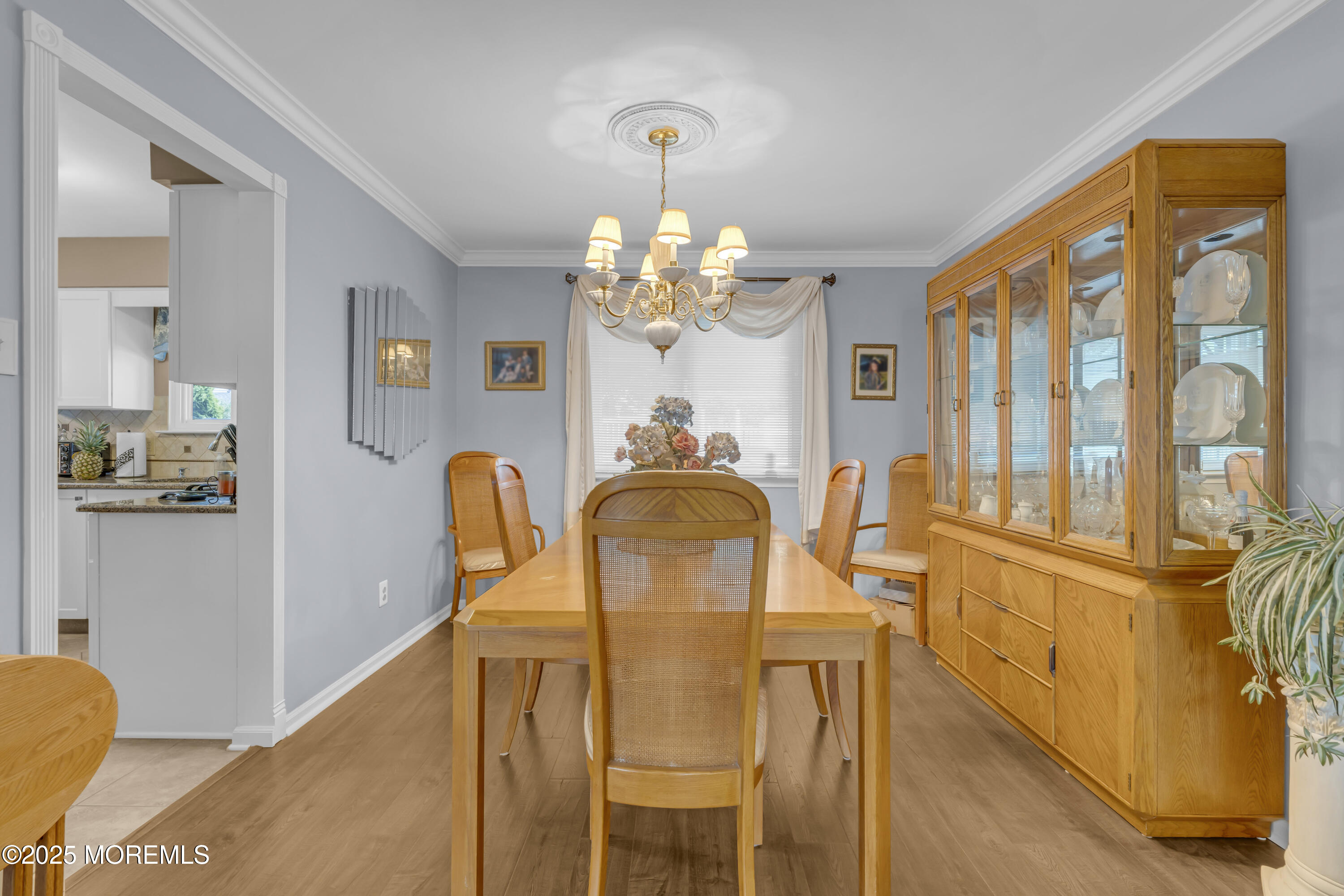32 Kiwi Loop Howell, NJ 07731 - Photo 9 of 42 a dining room with furniture and chandelier kitchen view
