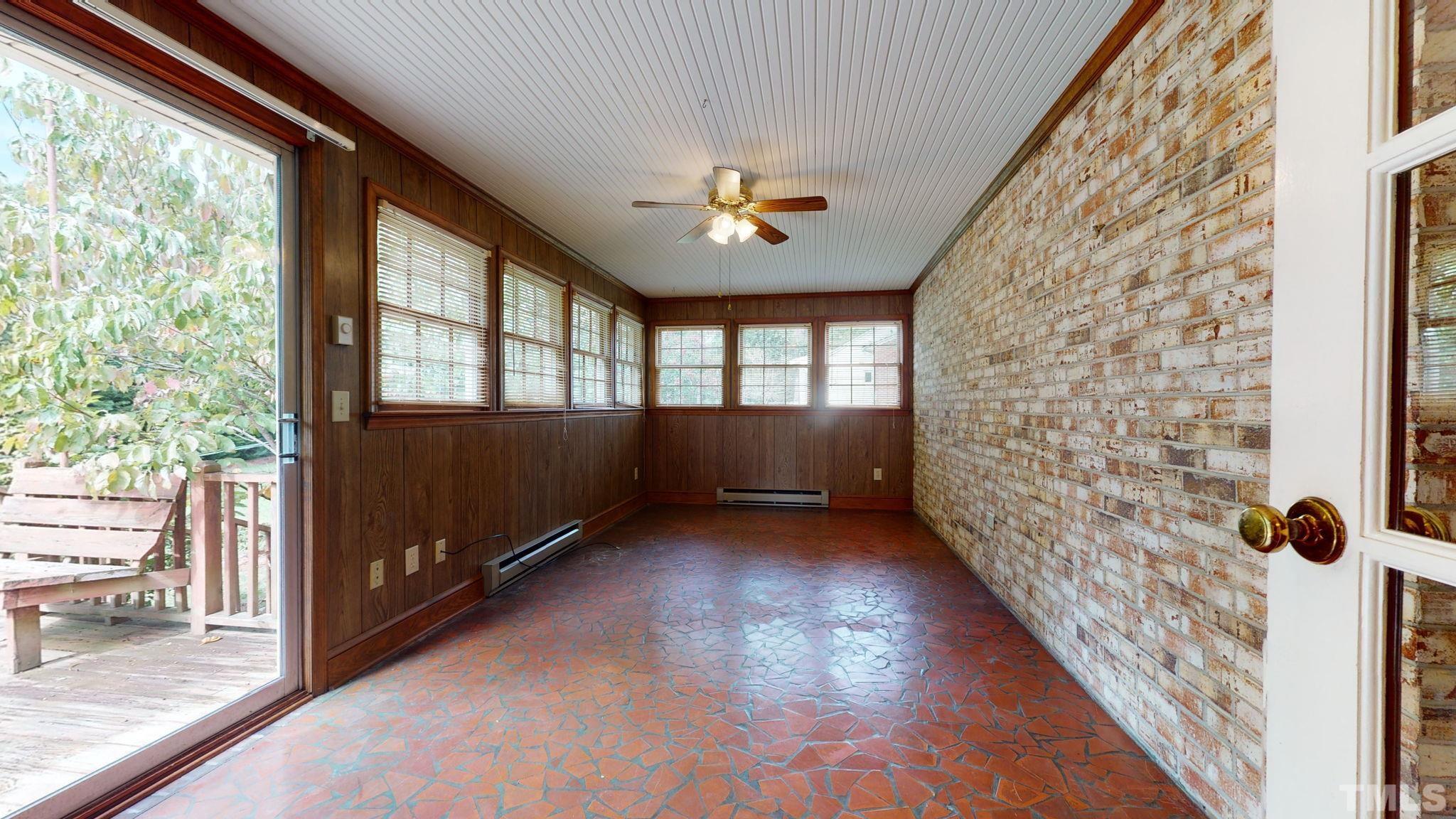 261 Badger Circle Roxboro, NC 27573 - Photo 21 of 30 wooden floor in an empty room with a window