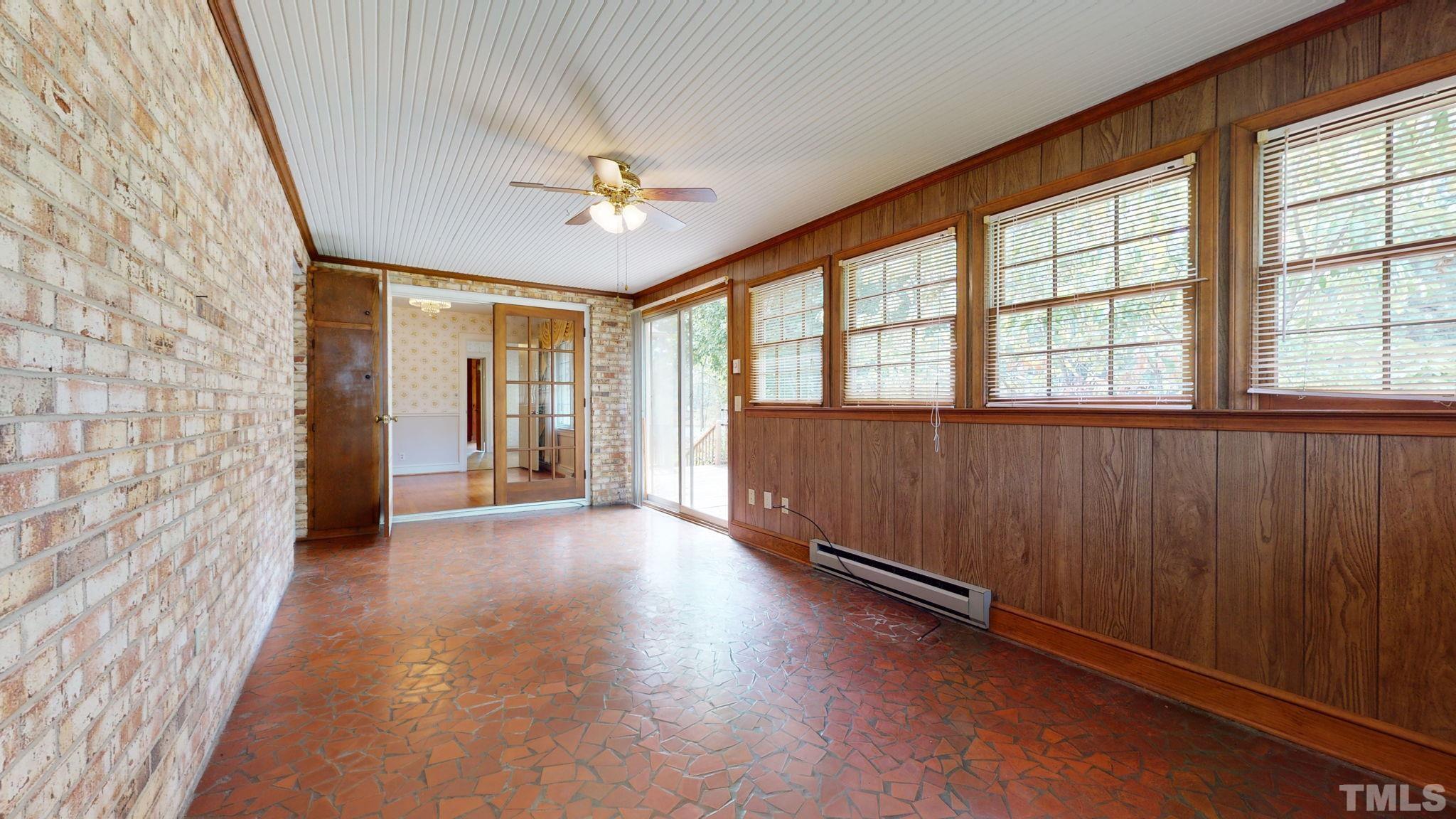261 Badger Circle Roxboro, NC 27573 - Photo 22 of 30 wooden floor in an empty room with a window