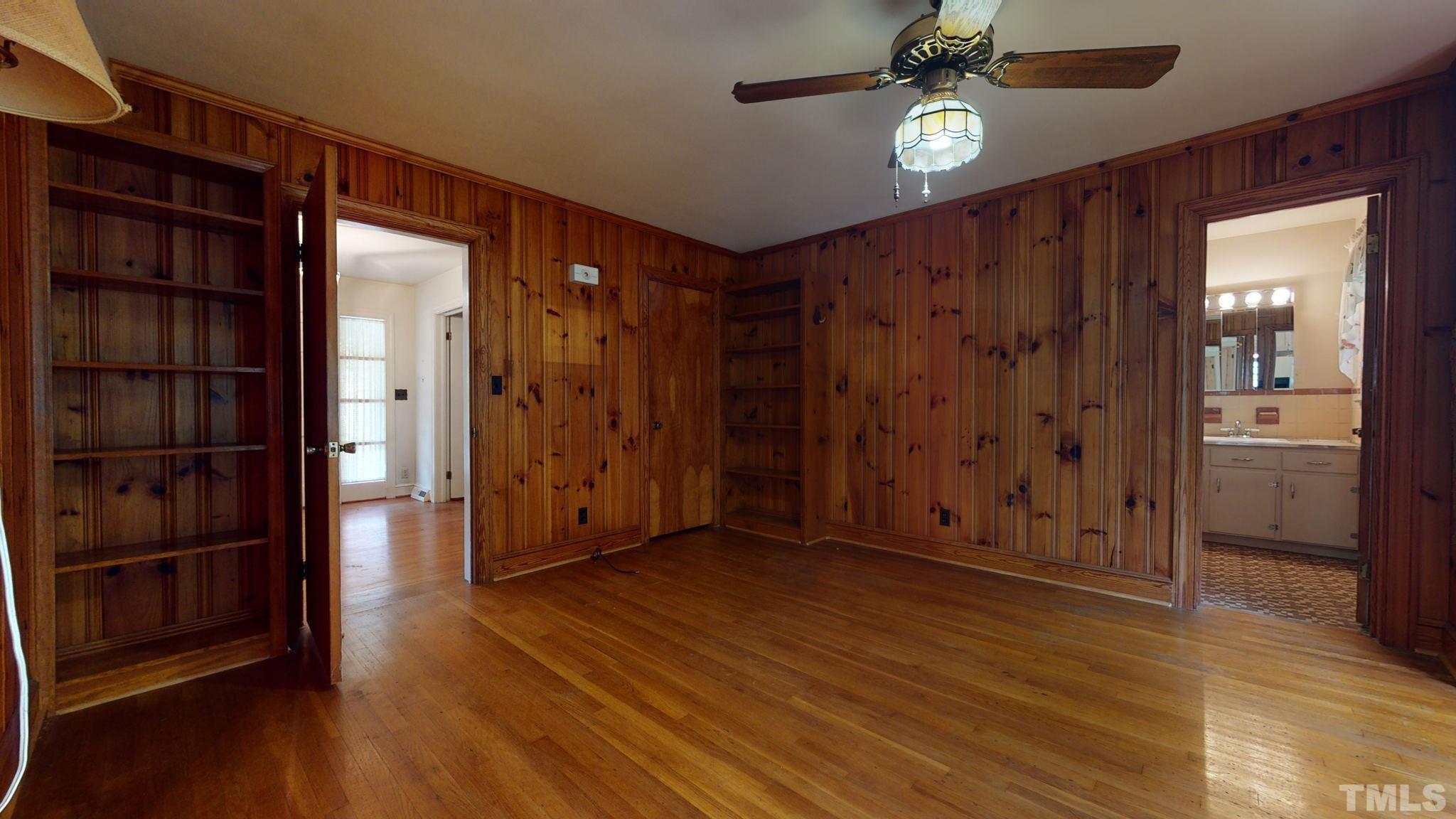 261 Badger Circle Roxboro, NC 27573 - Photo 6 of 30 wooden floor in an empty room with a window