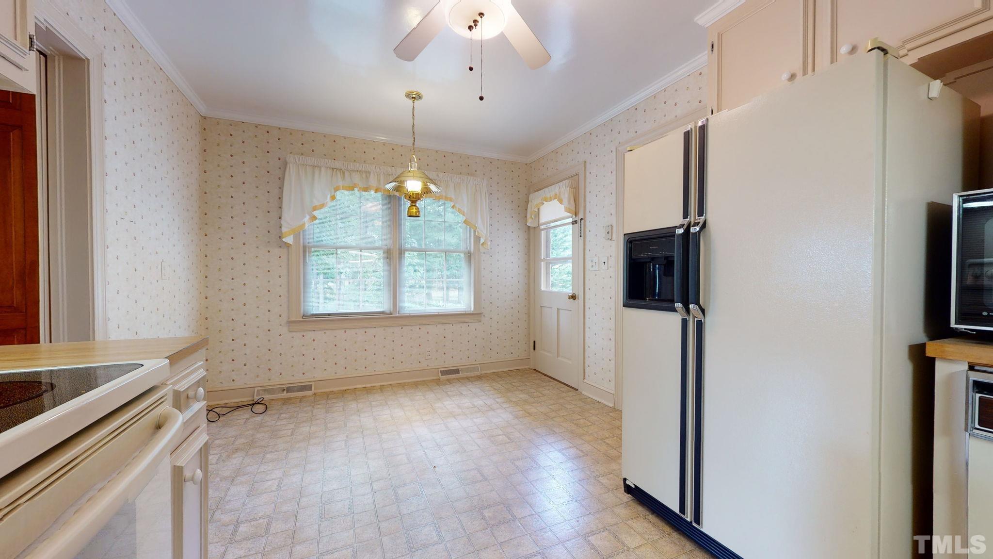 261 Badger Circle Roxboro, NC 27573 - Photo 9 of 30 a view of a kitchen and a sink cabinet fire place