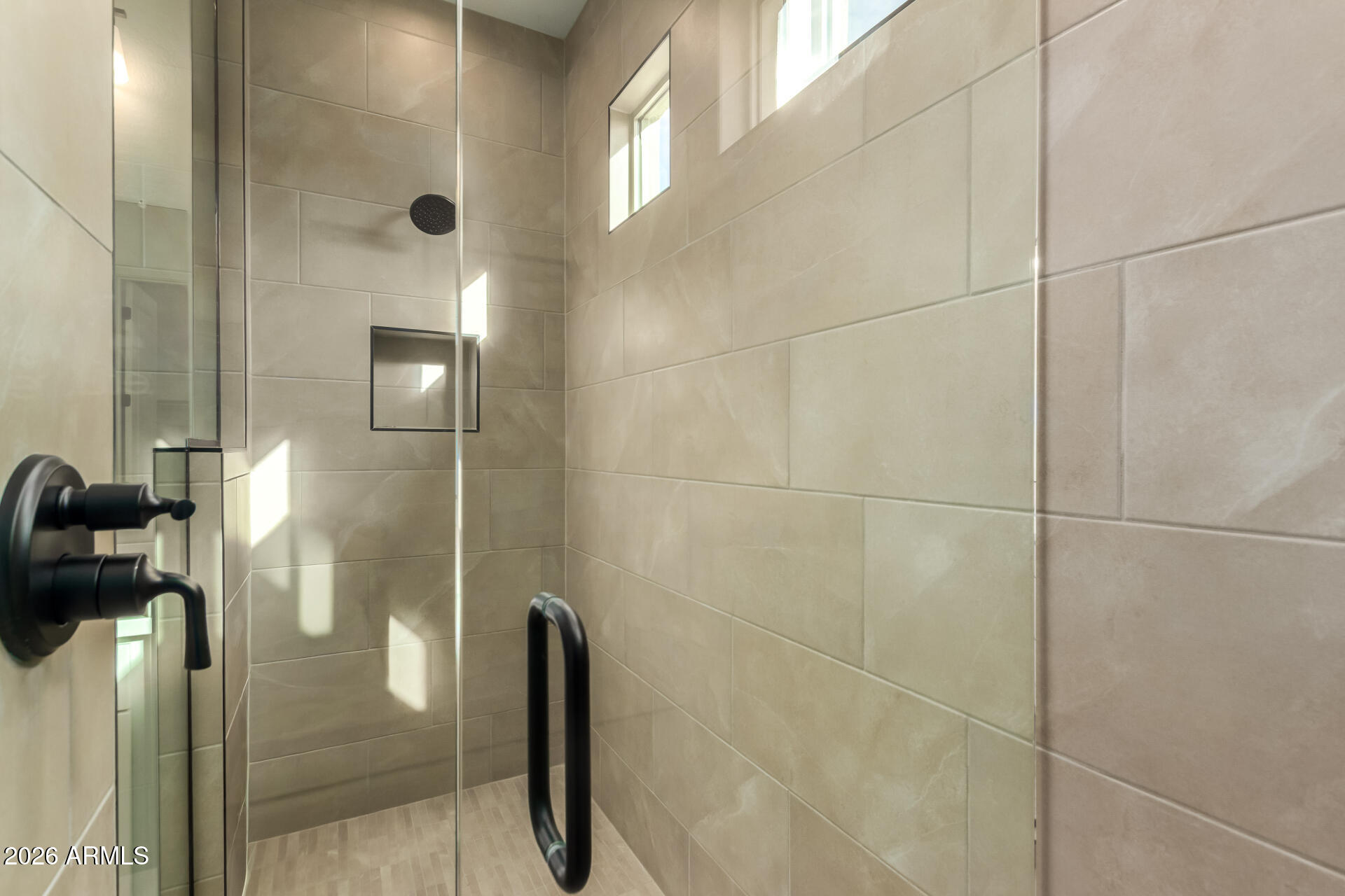 15890 West Miami Street Goodyear, AZ 85338 - Photo 15 of 51 a bathroom with a shower