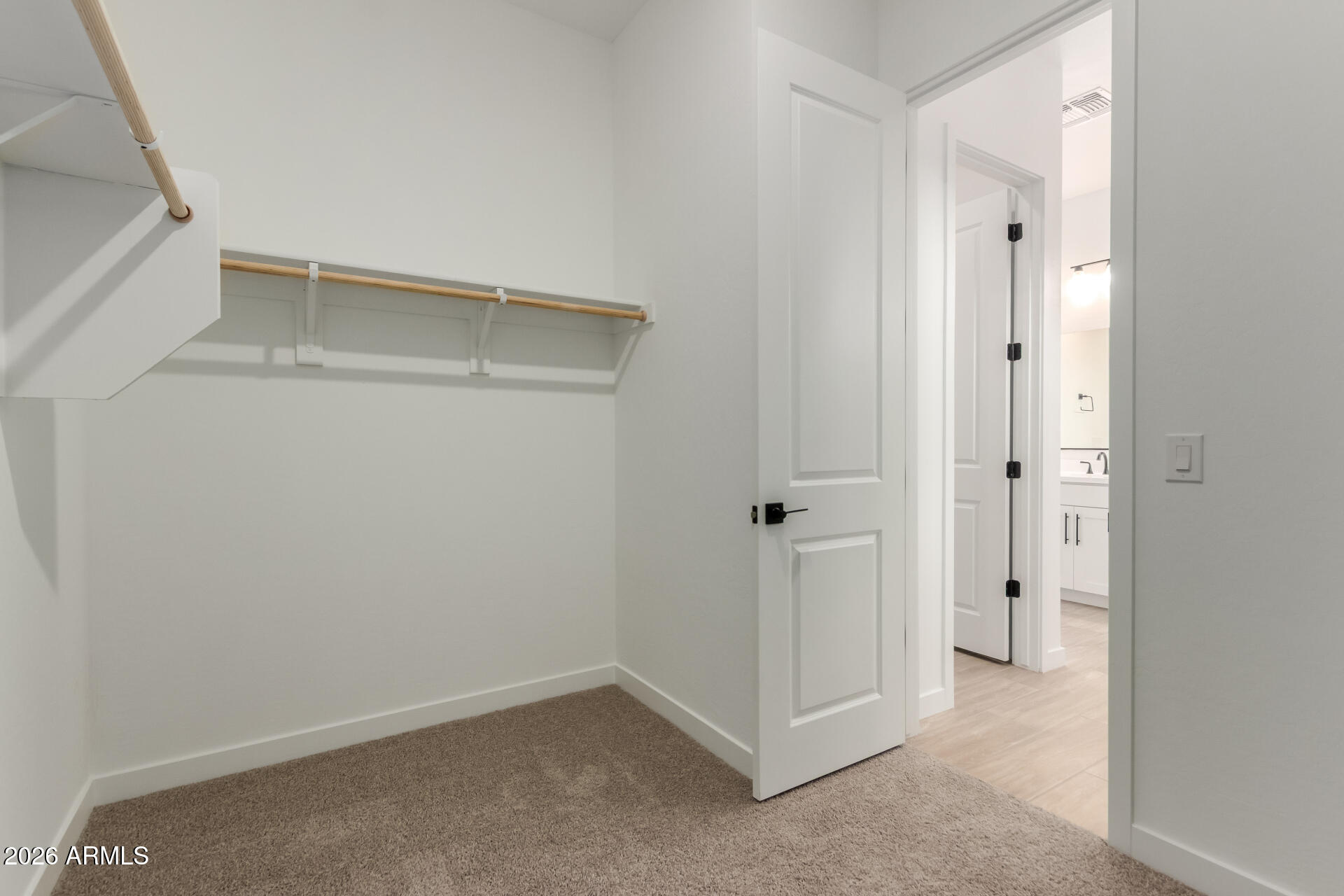 15890 West Miami Street Goodyear, AZ 85338 - Photo 17 of 51 a view of an empty walk in closet