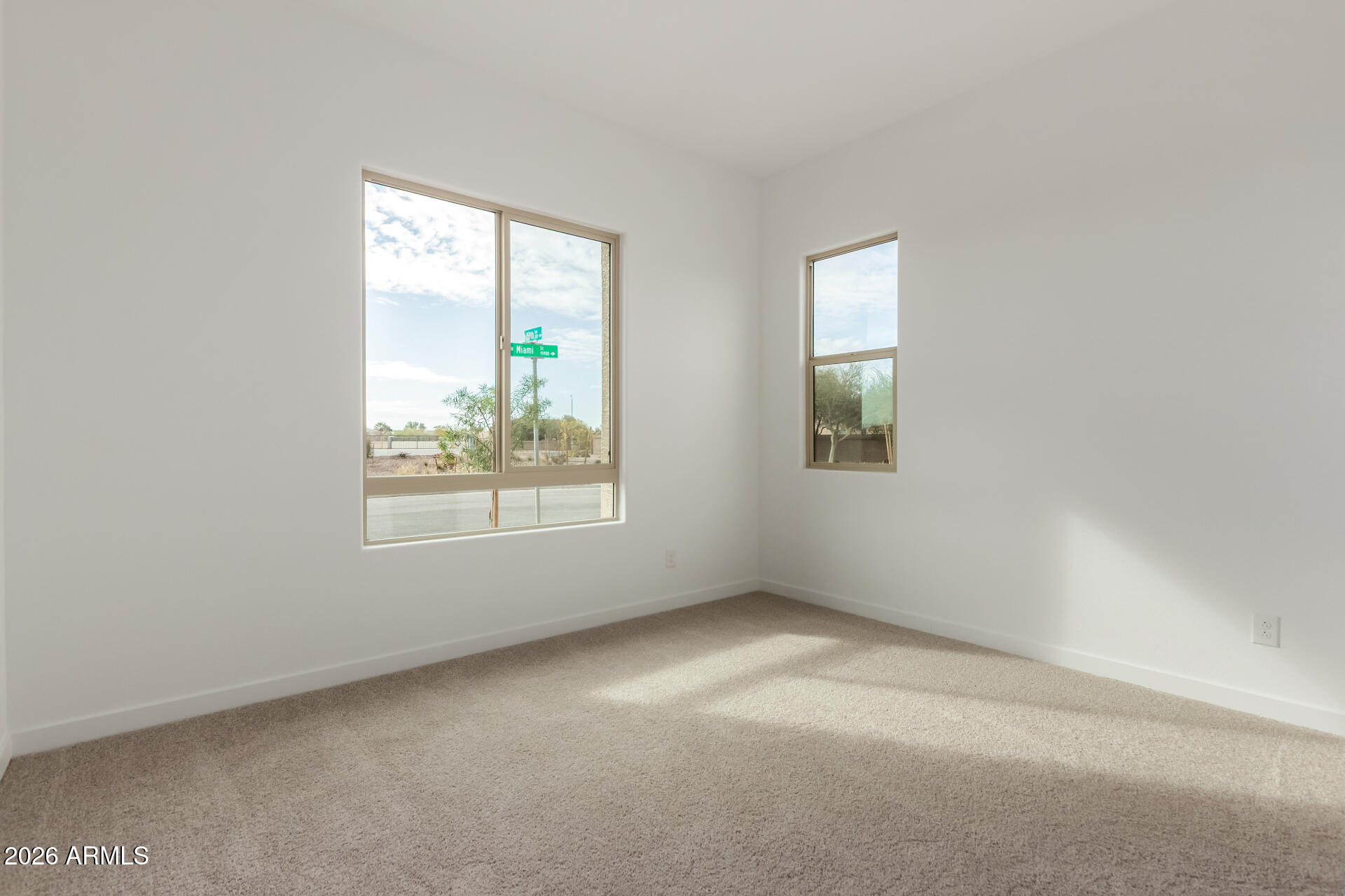 15890 West Miami Street Goodyear, AZ 85338 - Photo 19 of 51 an empty room with windows