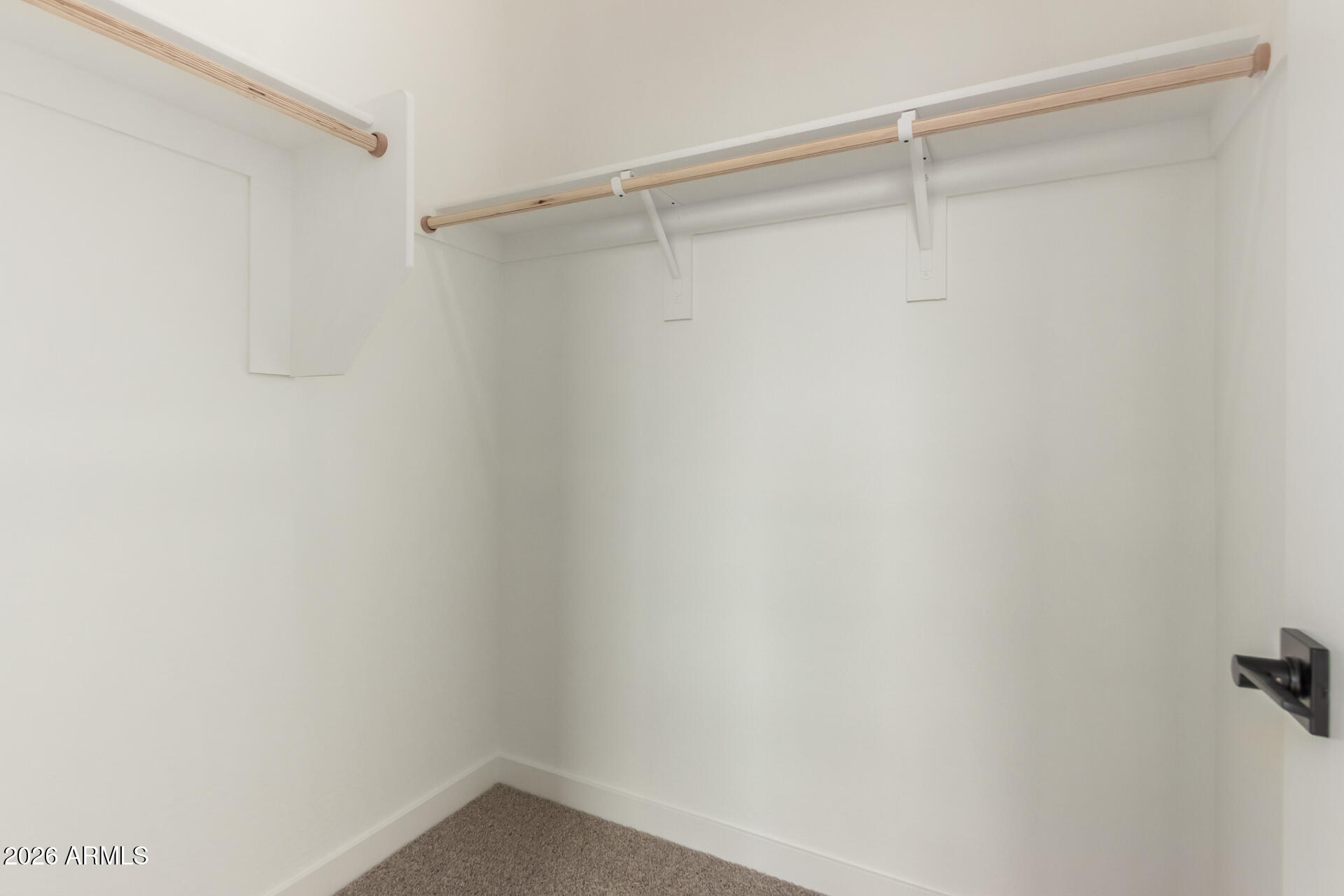 15890 West Miami Street Goodyear, AZ 85338 - Photo 21 of 51 a view of an empty walk in closet