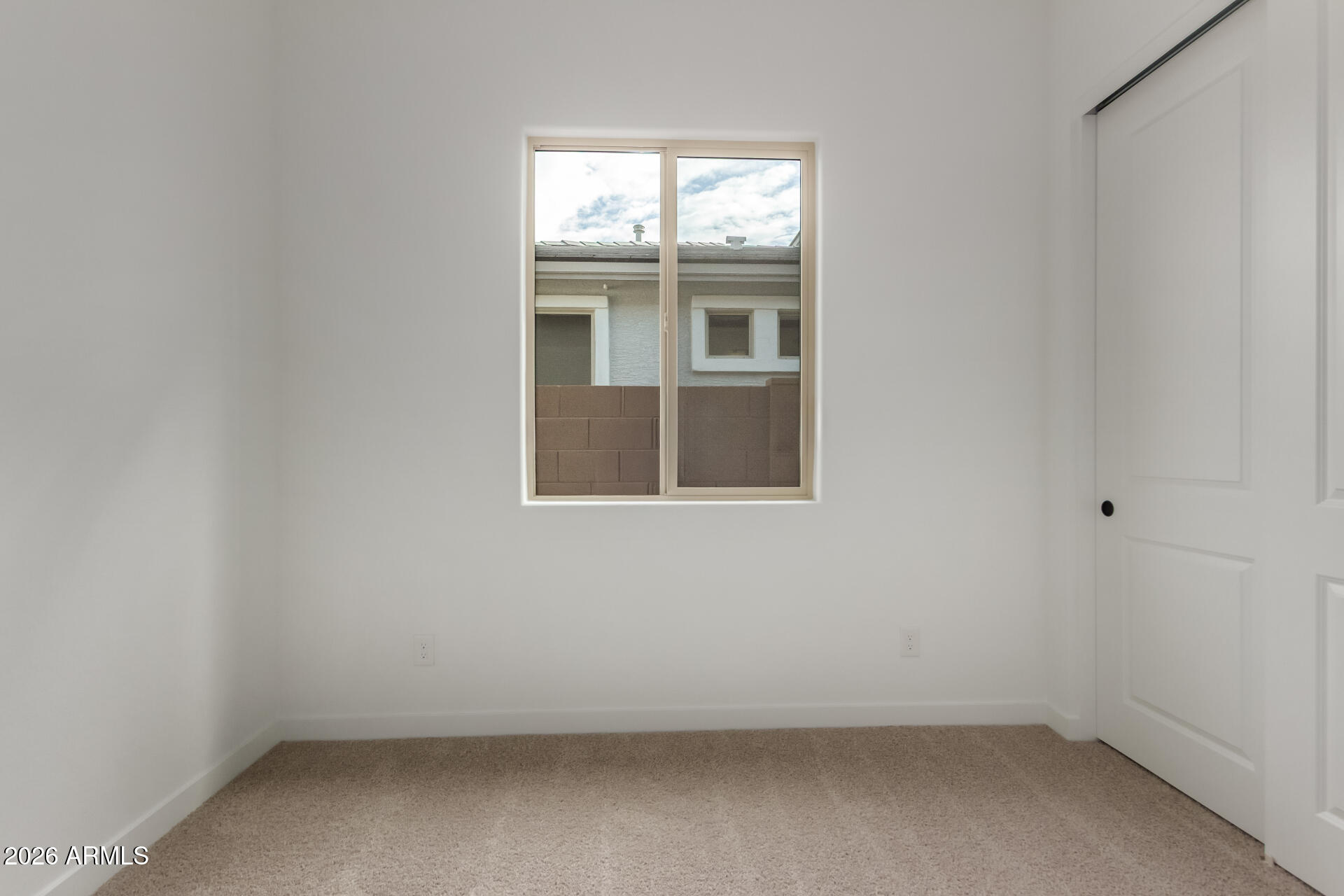 15890 West Miami Street Goodyear, AZ 85338 - Photo 29 of 51 an empty room with a window