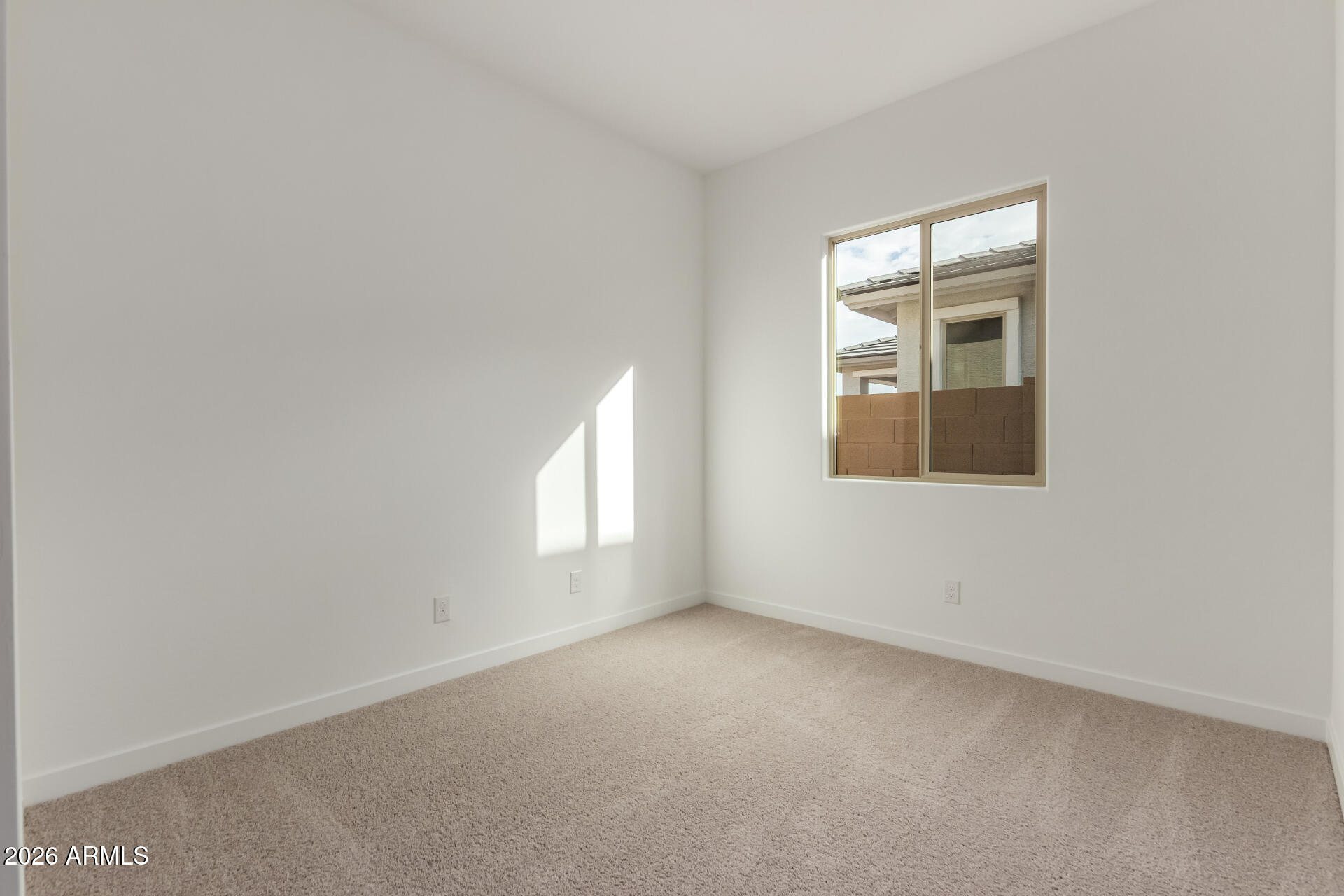 15890 West Miami Street Goodyear, AZ 85338 - Photo 30 of 51 an empty room with a window