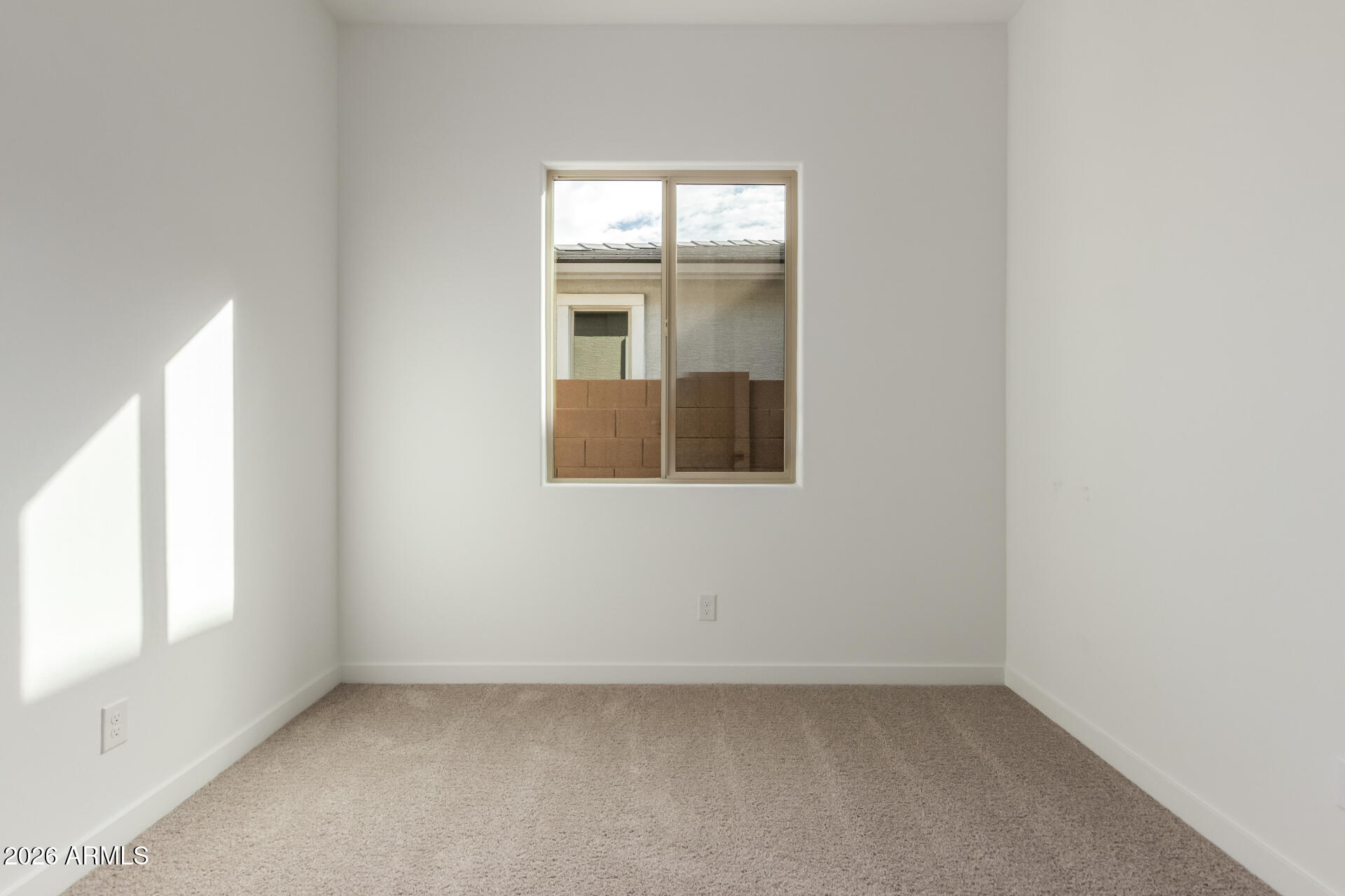 15890 West Miami Street Goodyear, AZ 85338 - Photo 32 of 51 an empty room with windows
