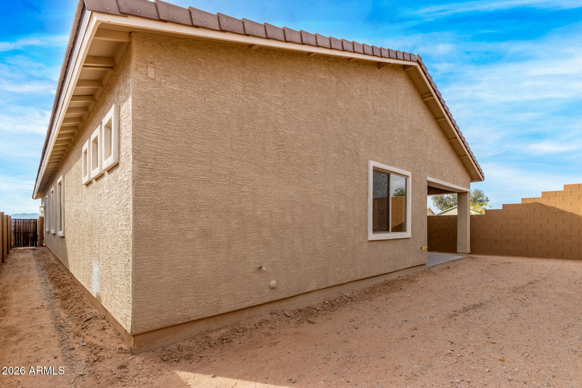 15890 West Miami Street Goodyear, AZ 85338 - Photo 40 of 51 a view of a house with a backyard