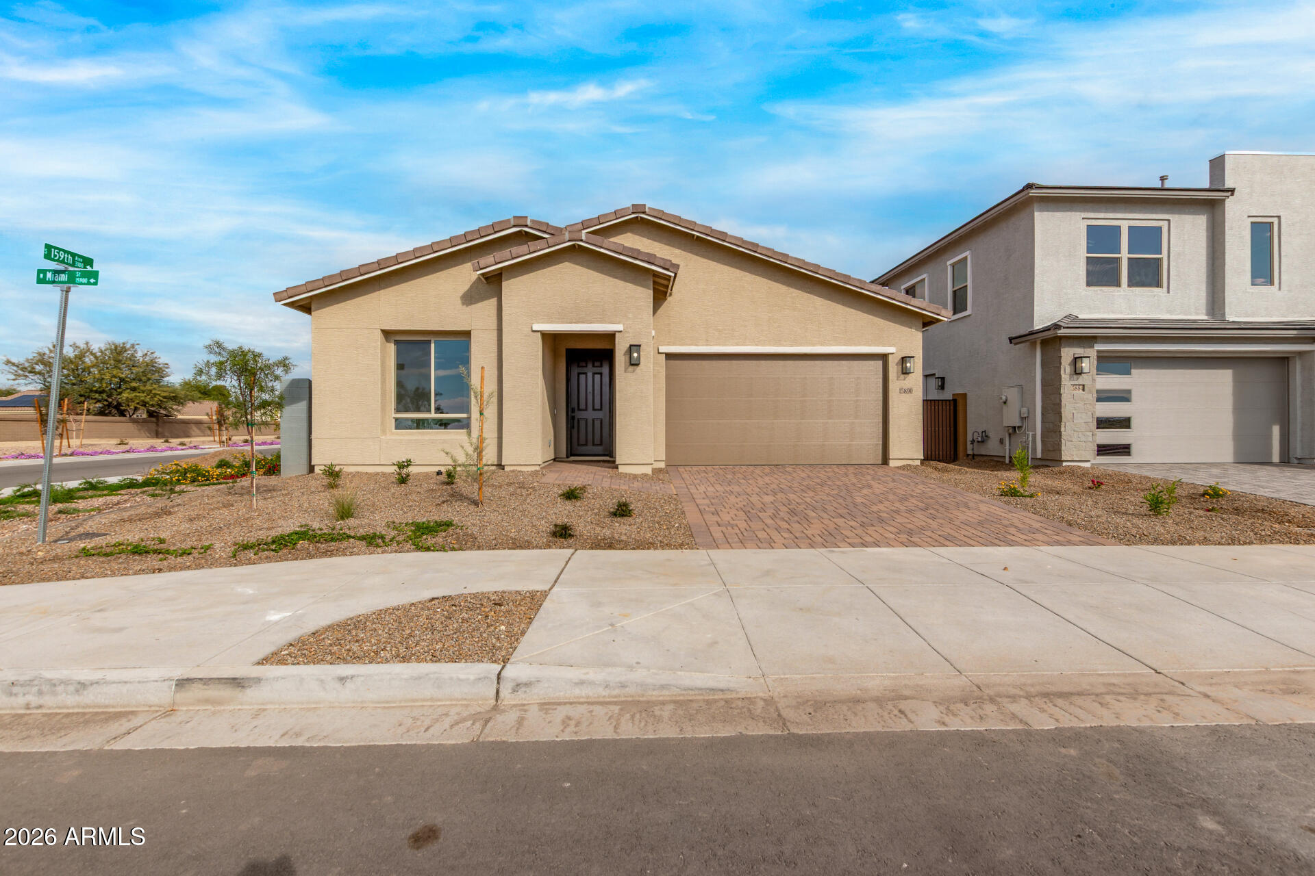 15890 West Miami Street Goodyear, AZ 85338 - Photo 43 of 51 a view of a house with a yard