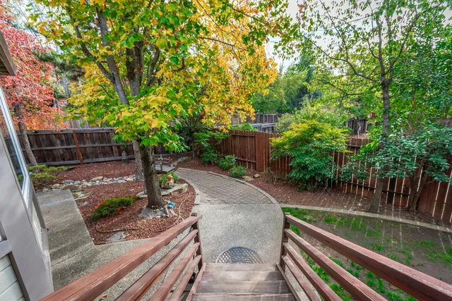 a view of yard with patio