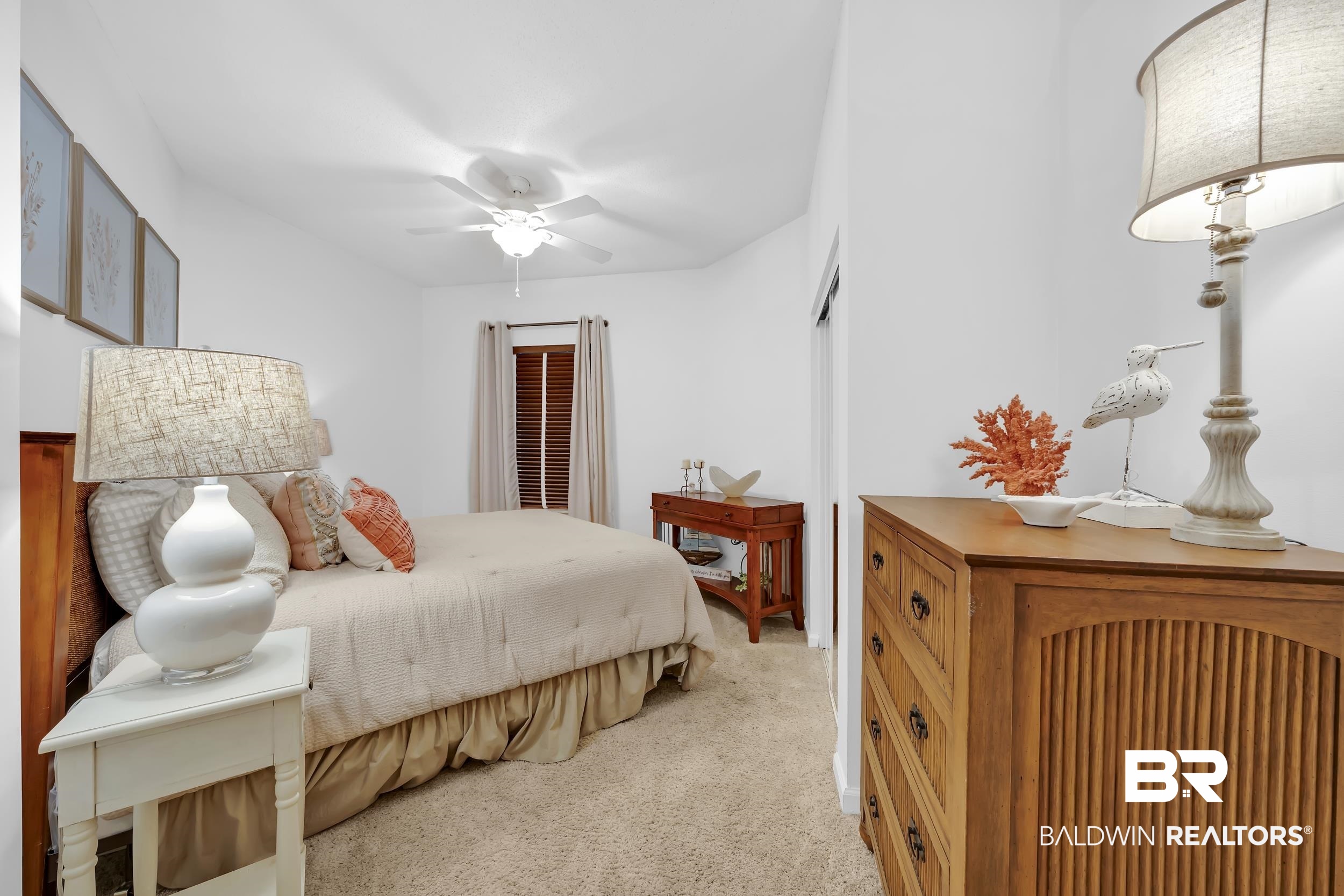 27282 Canal Road, Unit 104 Orange Beach, AL 36561 - Photo 48 of 79 Bedroom featuring light colored carpet and ceiling fan