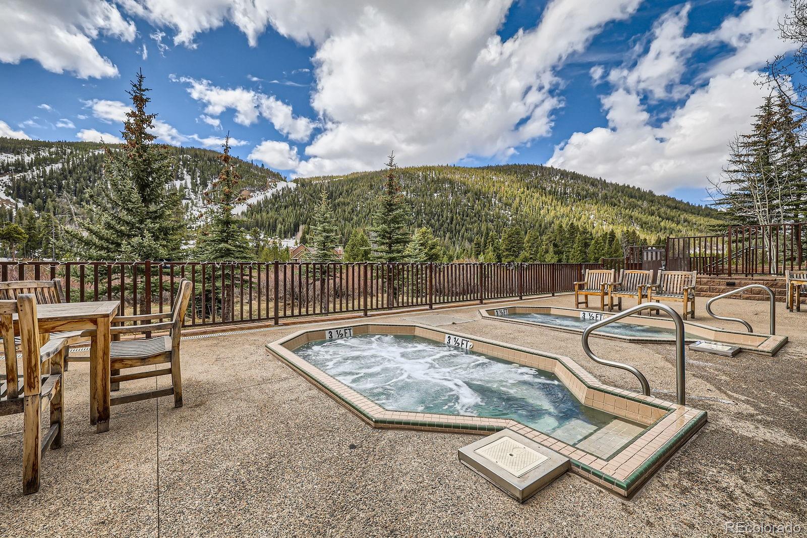 22714 Highway 6, Unit 5945 Keystone, CO 80435 - Photo 25 of 37 a view of a patio with swimming pool