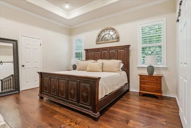 a view of a livingroom with furniture and a window