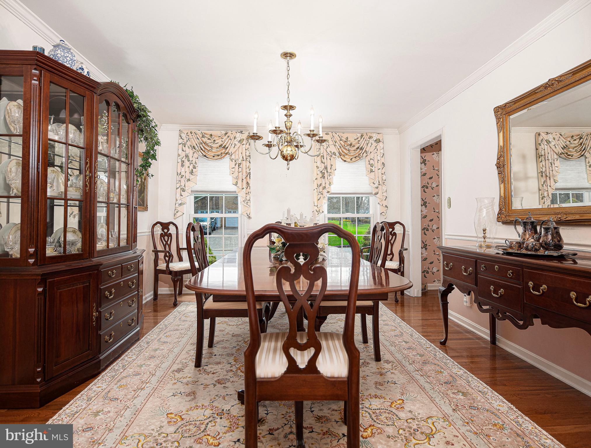 627 Northgate Road Aberdeen, MD 21001 - Photo 18 of 43 a view of a dining room with furniture a rug and wooden floor