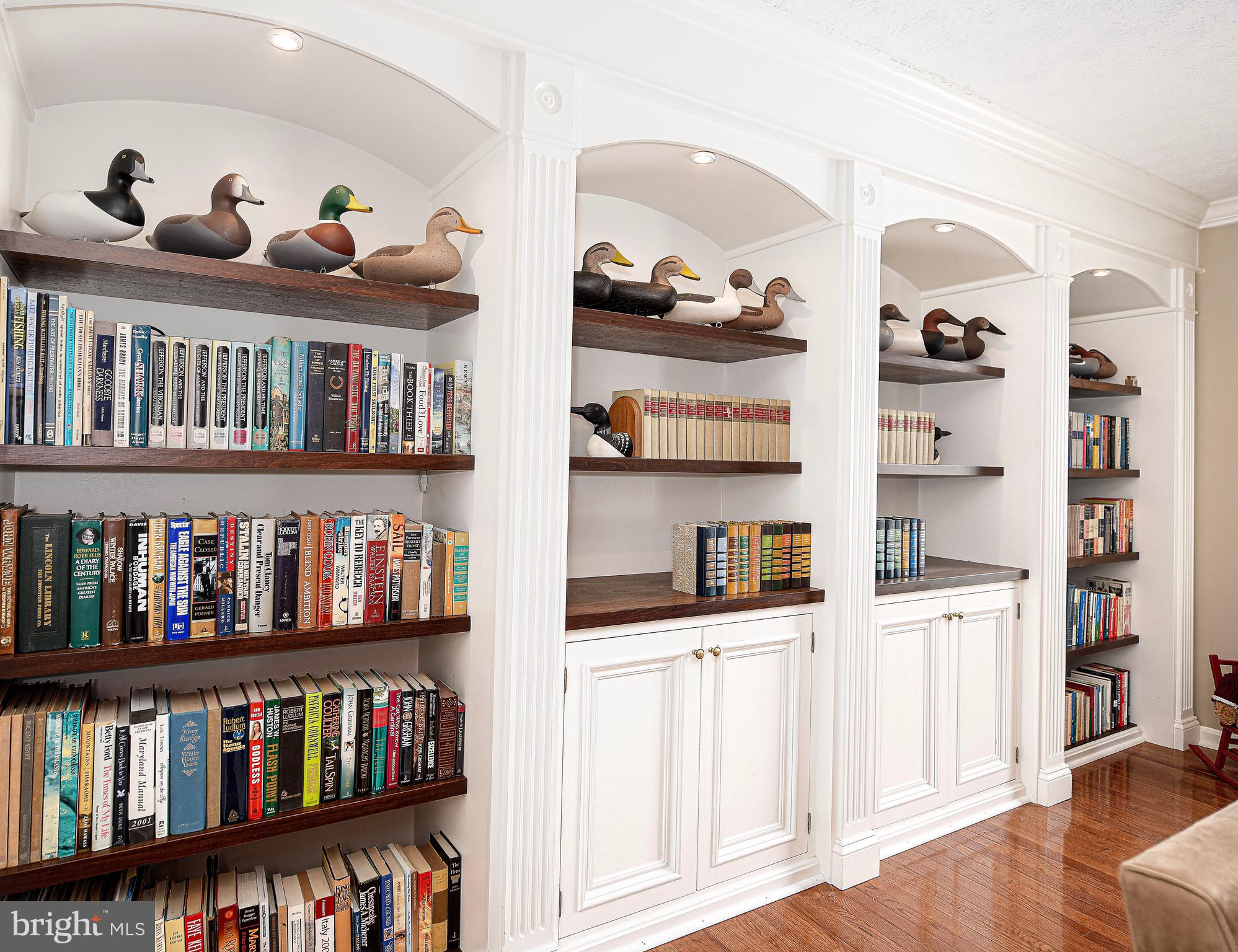 627 Northgate Road Aberdeen, MD 21001 - Photo 23 of 43 a room with lots of books and a painting on the wall