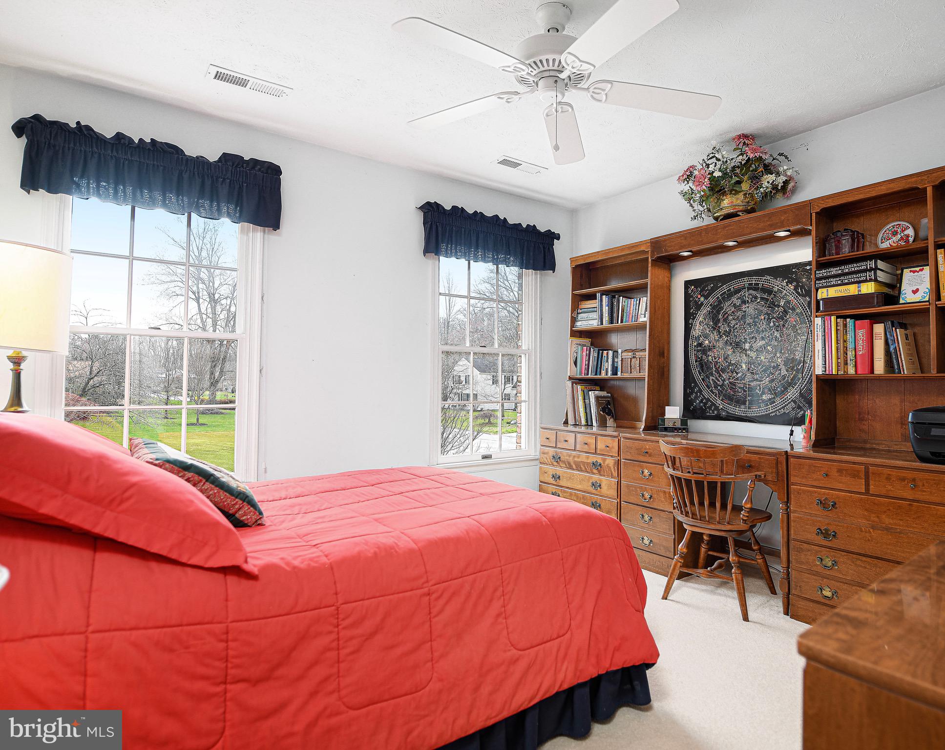 627 Northgate Road Aberdeen, MD 21001 - Photo 28 of 43 a bed room with a bed a dresser and a large window