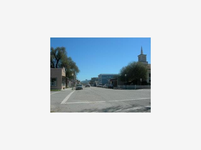 37 Mariposa Street San Juan Bautista, CA 95045 - Photo 9 of 9 a picture of a bench in front of a building