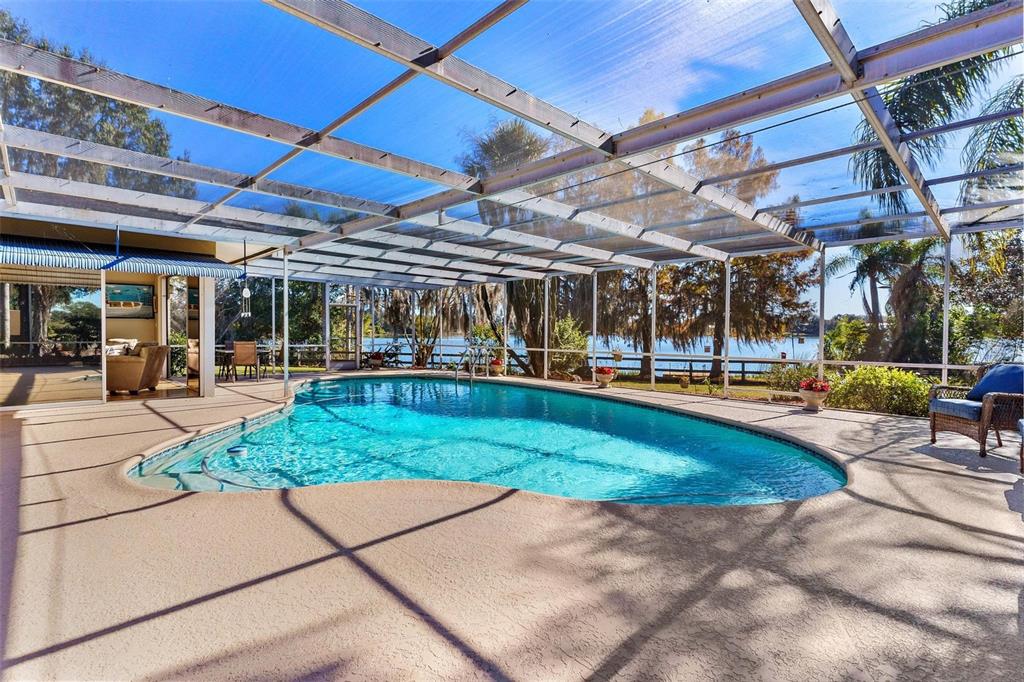 475 Guerrant Street Umatilla, FL 32784 - Photo 21 of 63 a view of a swimming pool with a patio