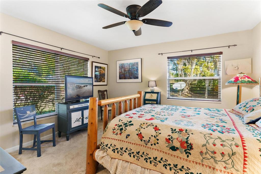 475 Guerrant Street Umatilla, FL 32784 - Photo 33 of 63 a bedroom with a bed dresser and a window