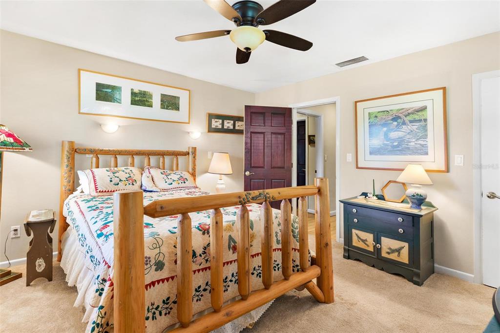 475 Guerrant Street Umatilla, FL 32784 - Photo 34 of 63 a bedroom with furniture and a window