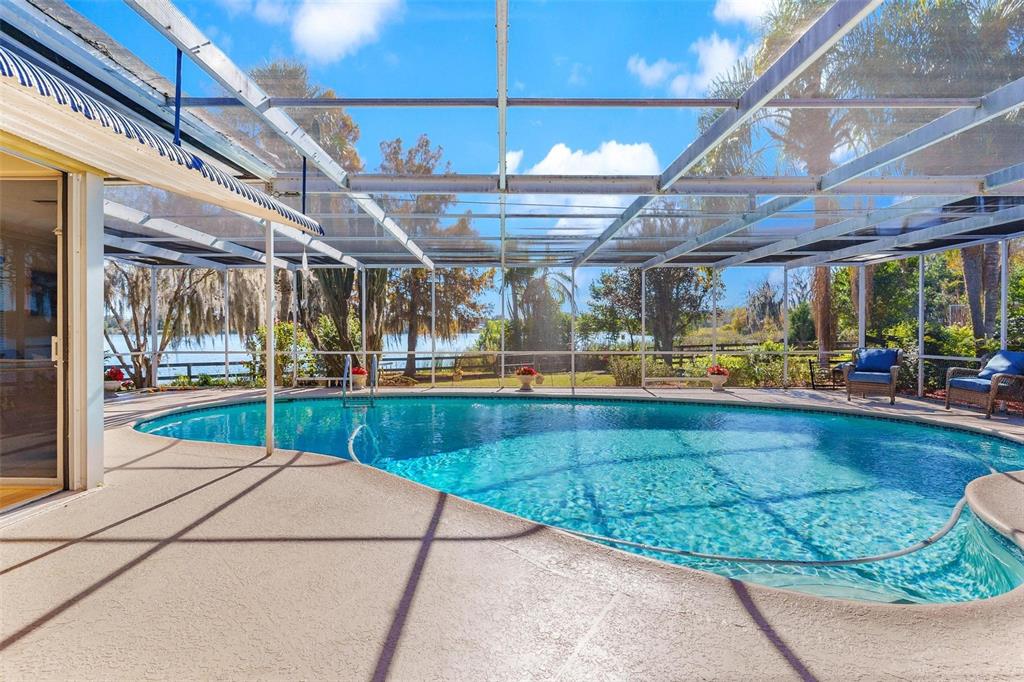 475 Guerrant Street Umatilla, FL 32784 - Photo 47 of 63 a view of a swimming pool with a patio