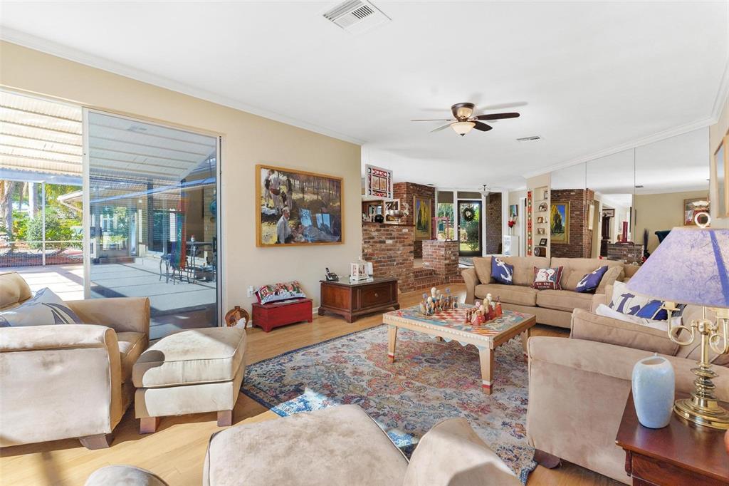 475 Guerrant Street Umatilla, FL 32784 - Photo 9 of 63 a living room with furniture and a large window
